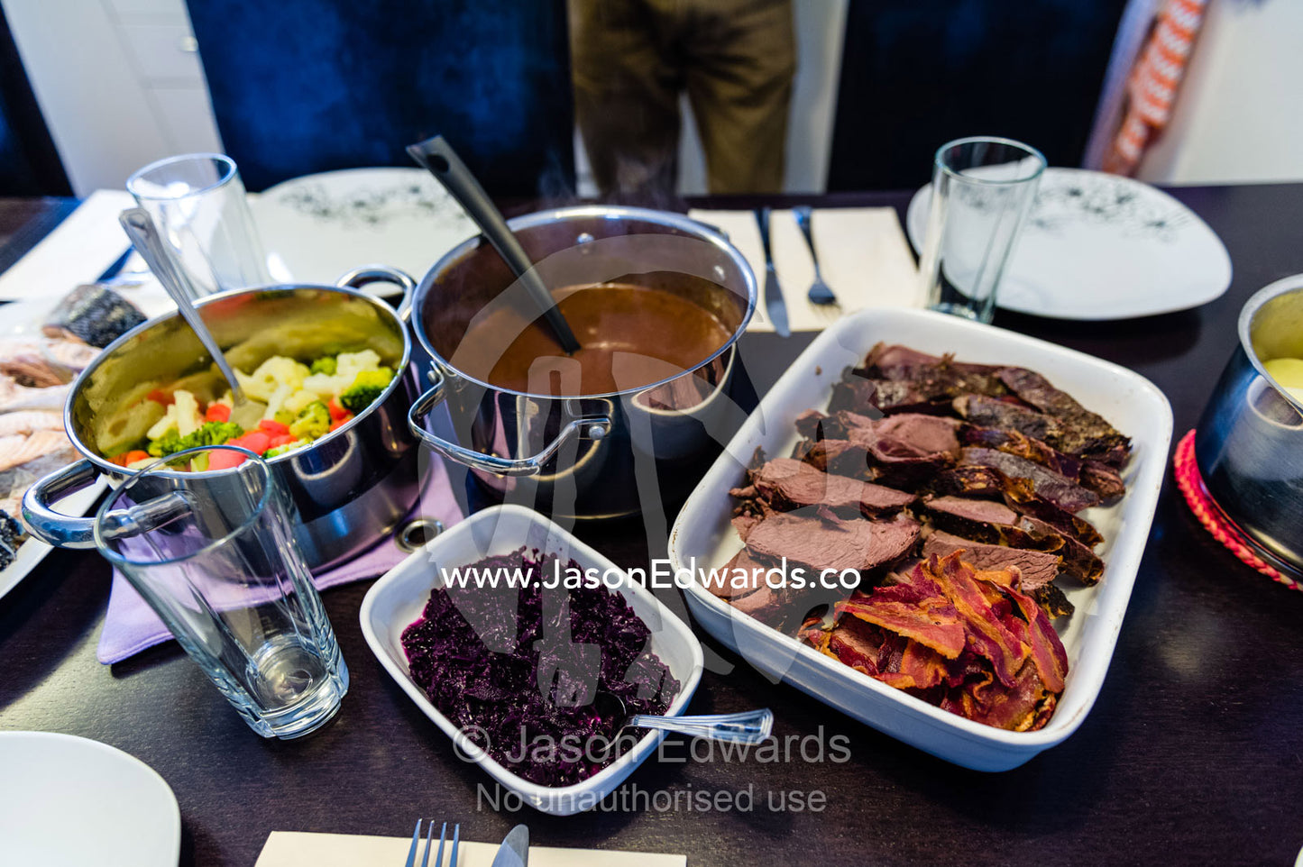 A hearty feast of fresh caught fish, caribou meat and vegetables for guests in a Greenlandic home. Kangaamiut, Gammel Sukkertoppen, Qeqqata Municipality, Greenland.