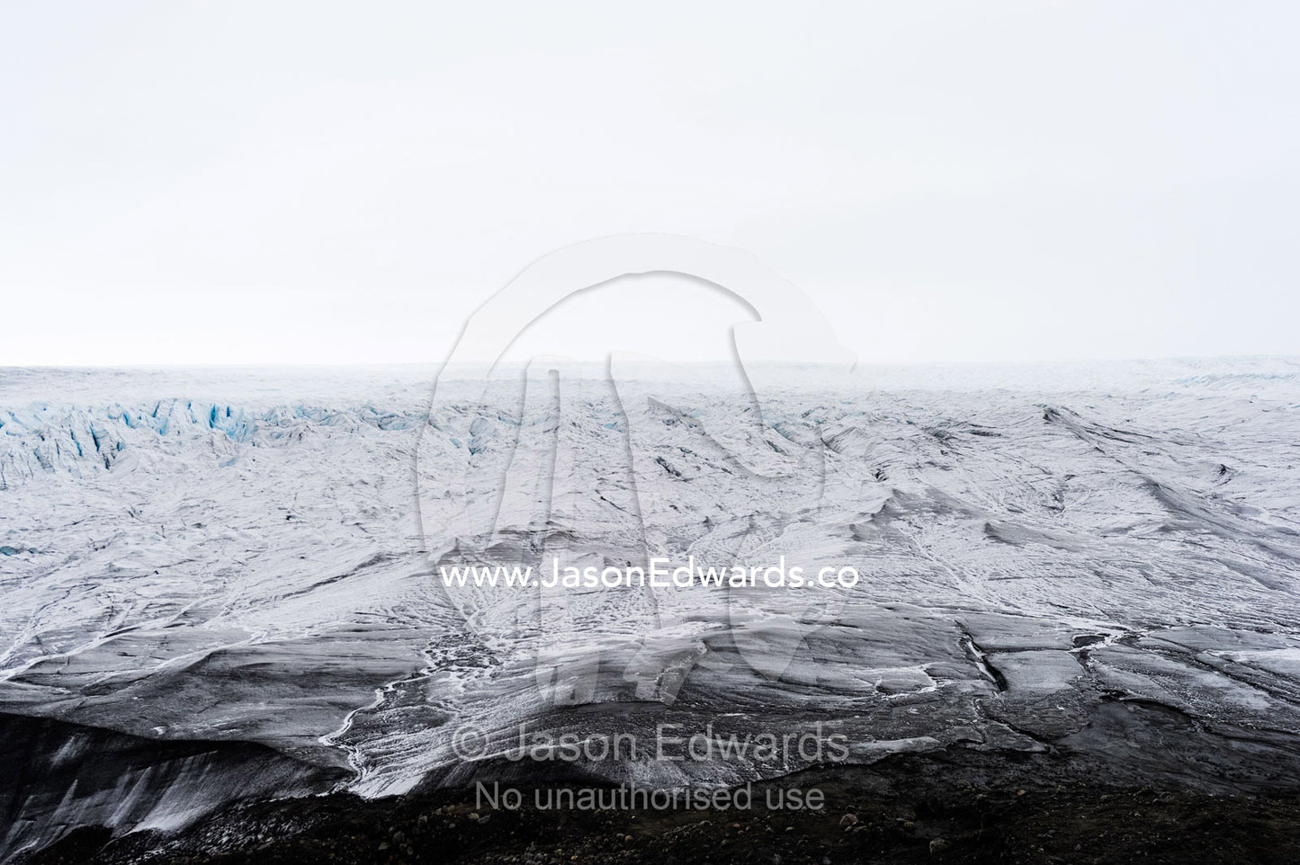 The frozen and barren wasteland of ice and crevasse on the surface of the Greenland Ice Sheet. Greenland Ice Sheet, Qeqqata Municipality, Kangerlussuaq, Greenland.