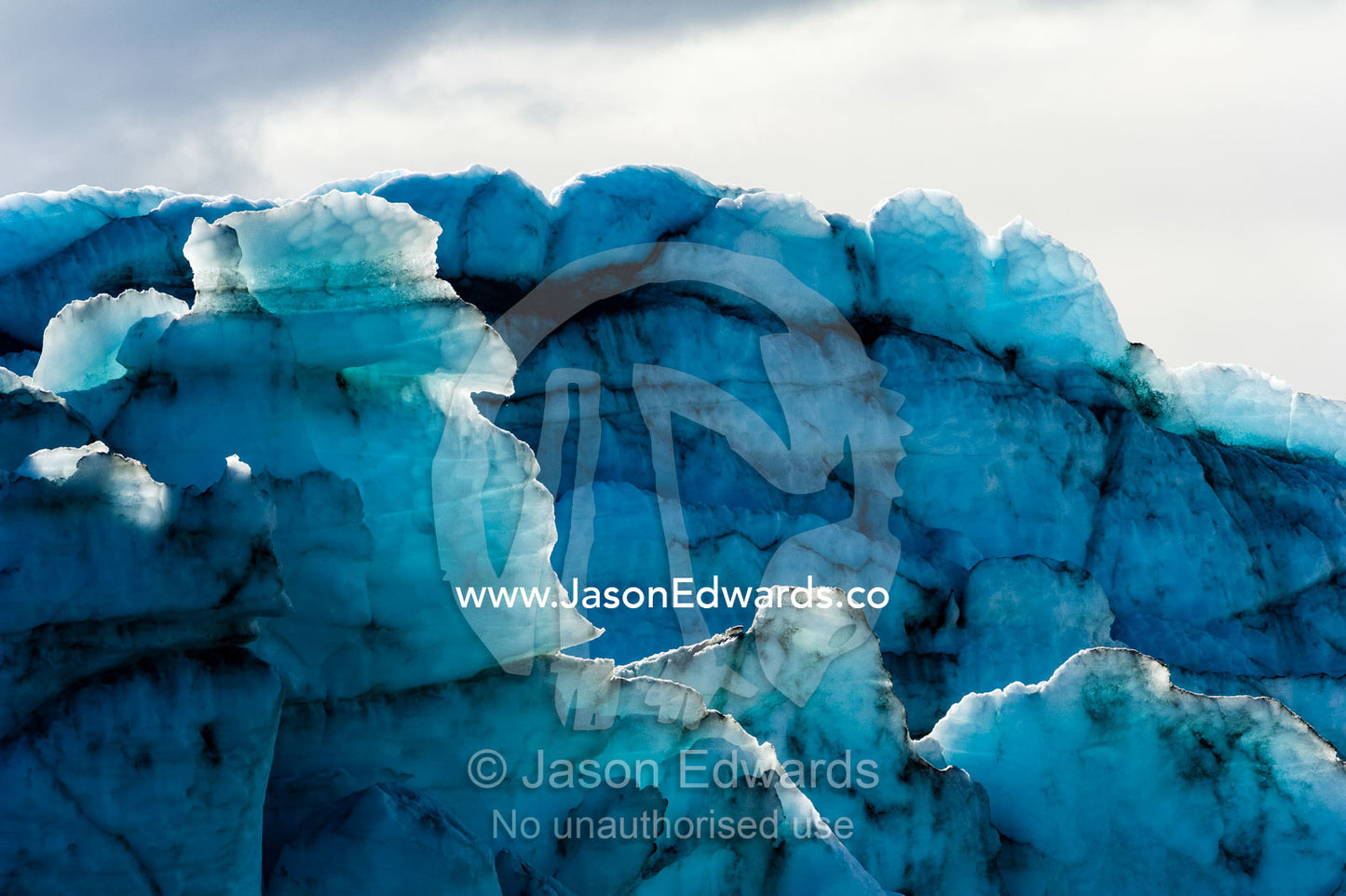 Treacherous jagged ice spires on a glacier fracture zone known as serac. Russell Glacier, Greenland Ice Sheet, Qeqqata Municipality, Kangerlussuaq, Greenland.
