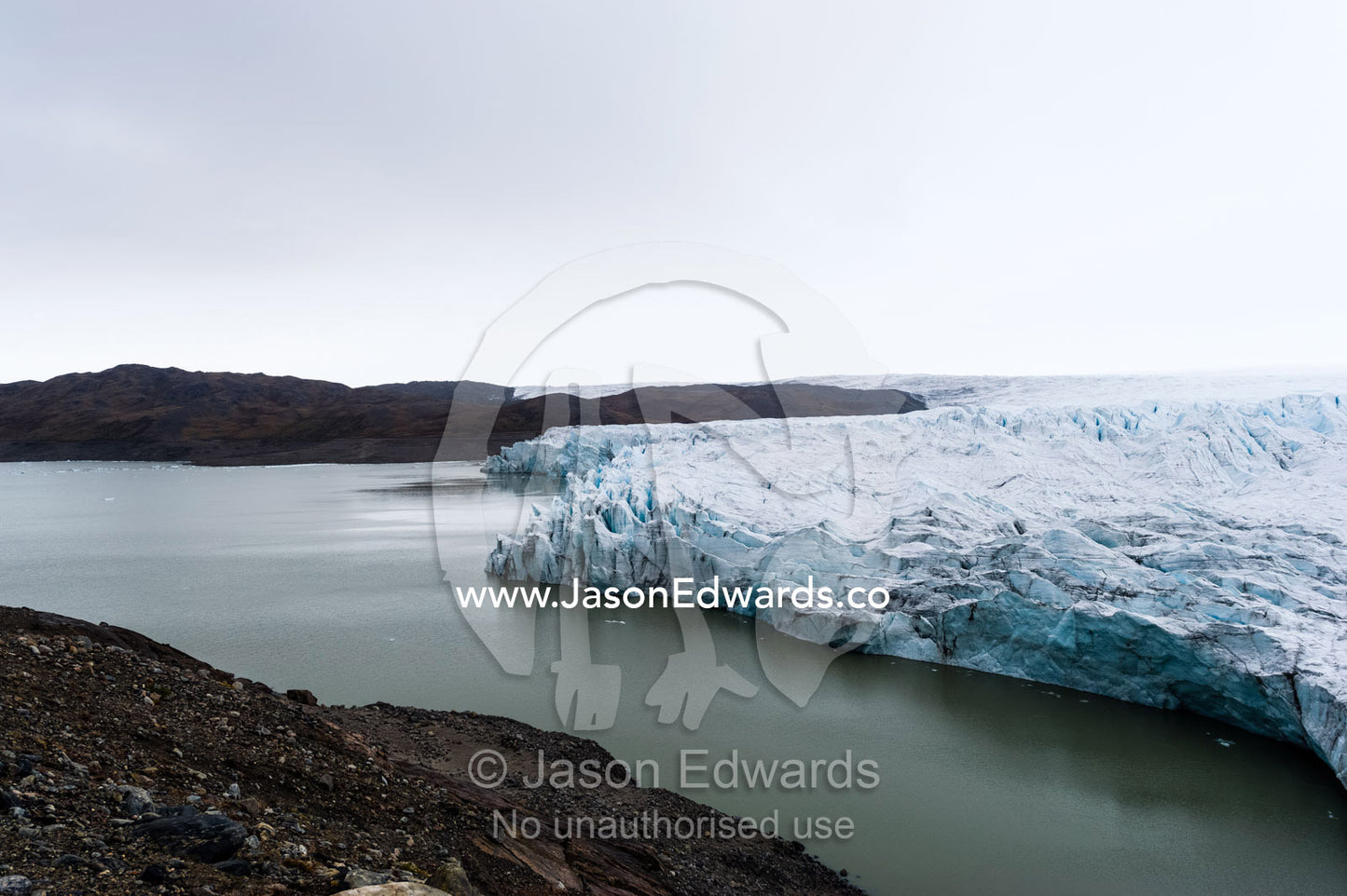 The fracture zone of a glacier on the Greenland Ice Sheet ending in a lake. Isunngua Highland, Greenland Ice Sheet, Kangerlussuaq, Qeqqata Municipality, Greenland.