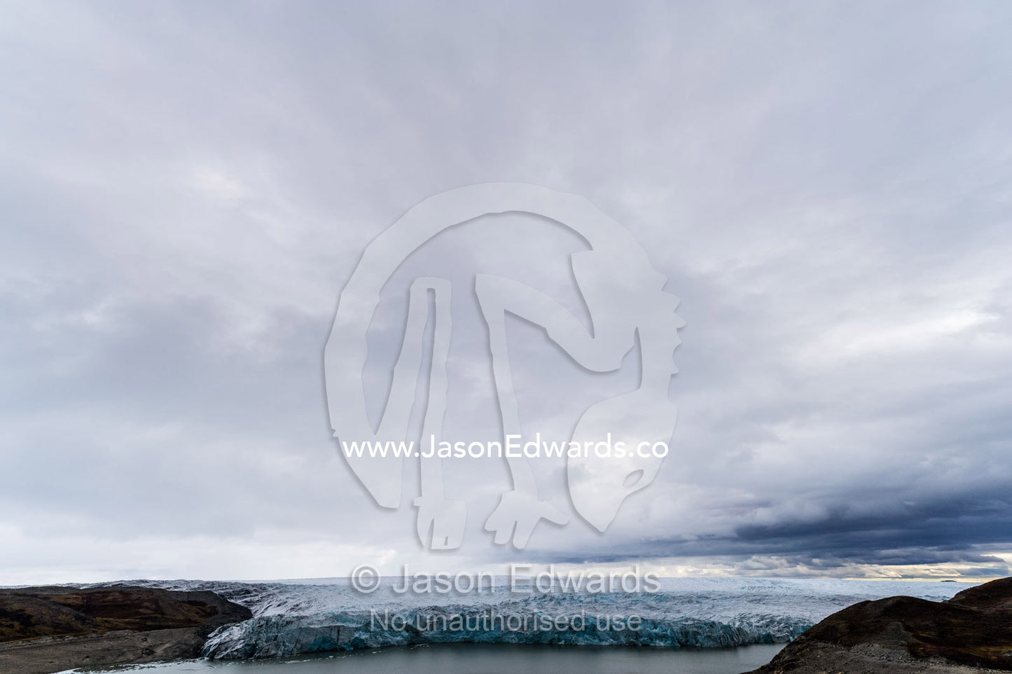 The ice fracture zone of a glacier on the Greenland Ice Sheet ending in a lake. Isunngua Highland, Greenland Ice Sheet, Kangerlussuaq, Qeqqata Municipality, Greenland.