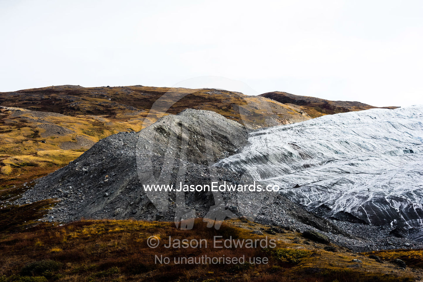 A pile of rock and silt debris deposited by the leading edge of a glacier. Russell Glacier, Greenland Ice Sheet, Qeqqata Municipality, Kangerlussuaq, Greenland.