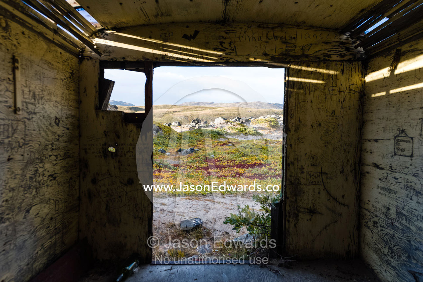 Graffiti in an abandoned field hospital at the base of a glacier where tourist were injured by an ice fall. Russell Glacier, Greenland Ice Sheet, Qeqqata Municipality, Kangerlussuaq, Greenland.