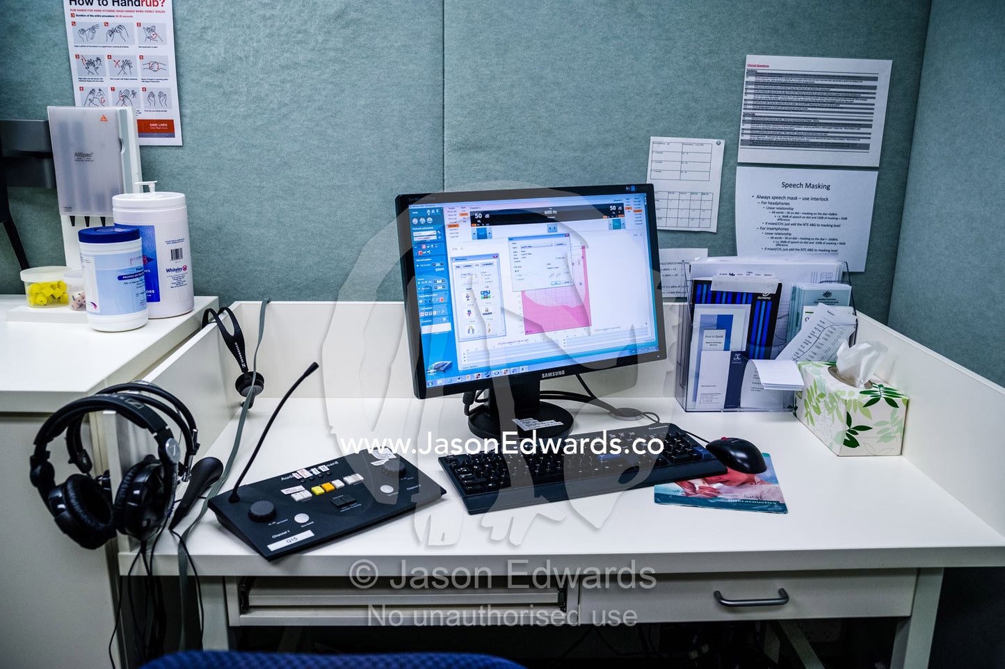 Computers and hearing test equipment in an audiologist clinic. The University of Melbourne Audiology Clinic, Carlton, Melbourne, Victoria, Australia.