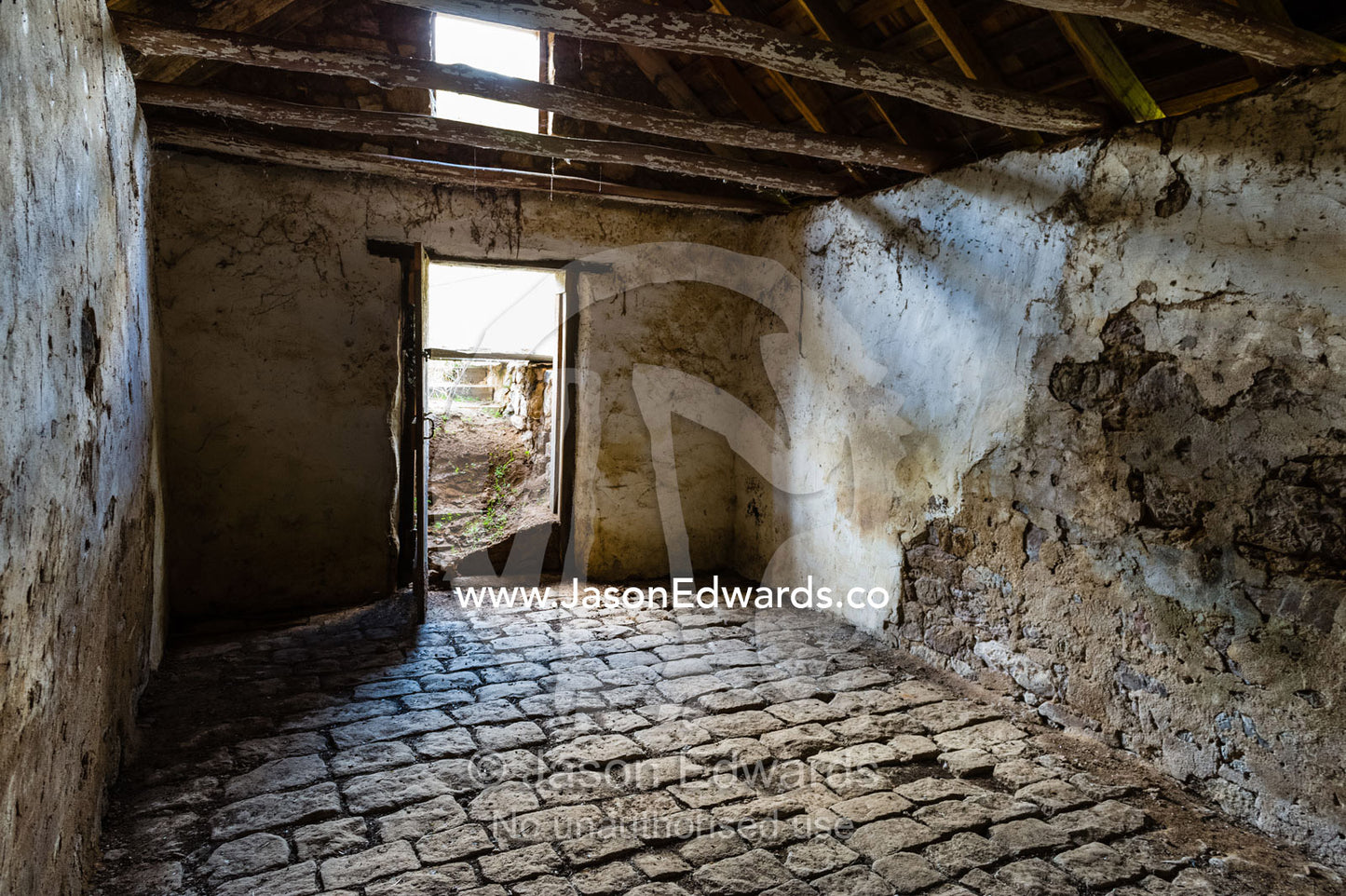 A 19th century grain storage shed built from locally quarried stones and timber. Faithfuls Creek Grain Storage, Euroa, Balmattum, Strathbogie, Victoria, Australia.