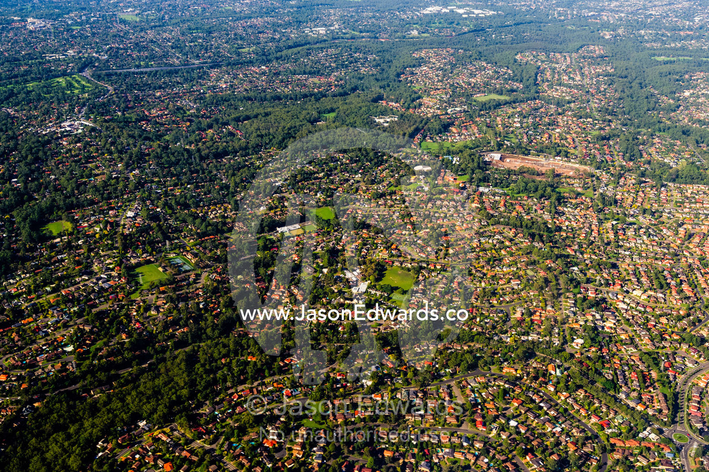 The rooftops of sprawling suburbs surrounding Sydney. Sydney, New South Wales, Australia.