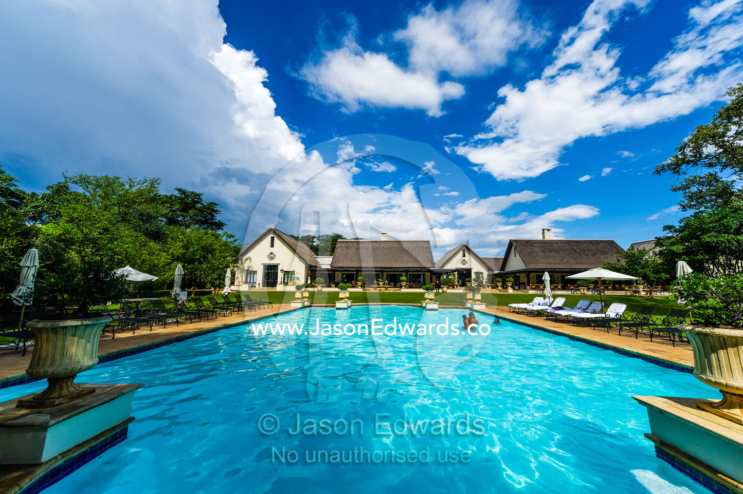 A cool refreshing pool at the Royal Livingstone Hotel overlooking Victoria Falls. The Royal Livingstone Hotel, Victoria Falls, Zambia.