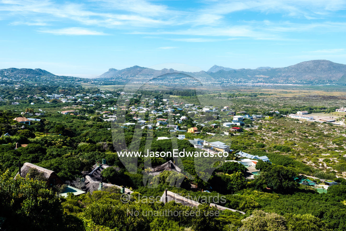 A small residential community nestled among coastal sand dunes. Noordhoek Beach, Cape Town, Chapmans Peak Drive, Western Cape, South Africa.