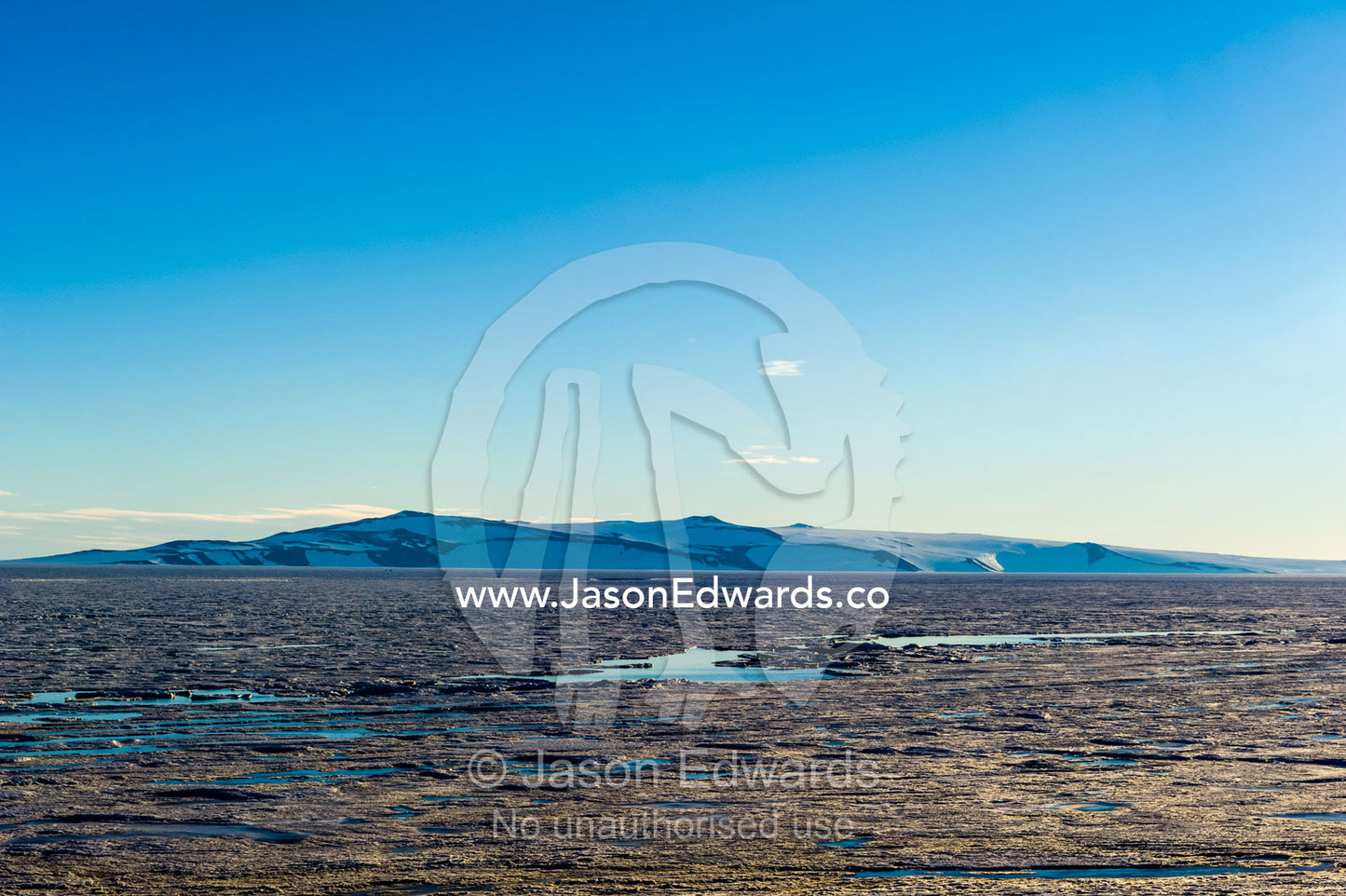 The slushy and fractured surface of sea ice melting in the Antarctic summer. Haskell Strait, McMurdo Sound, Ross Island, Antarctica