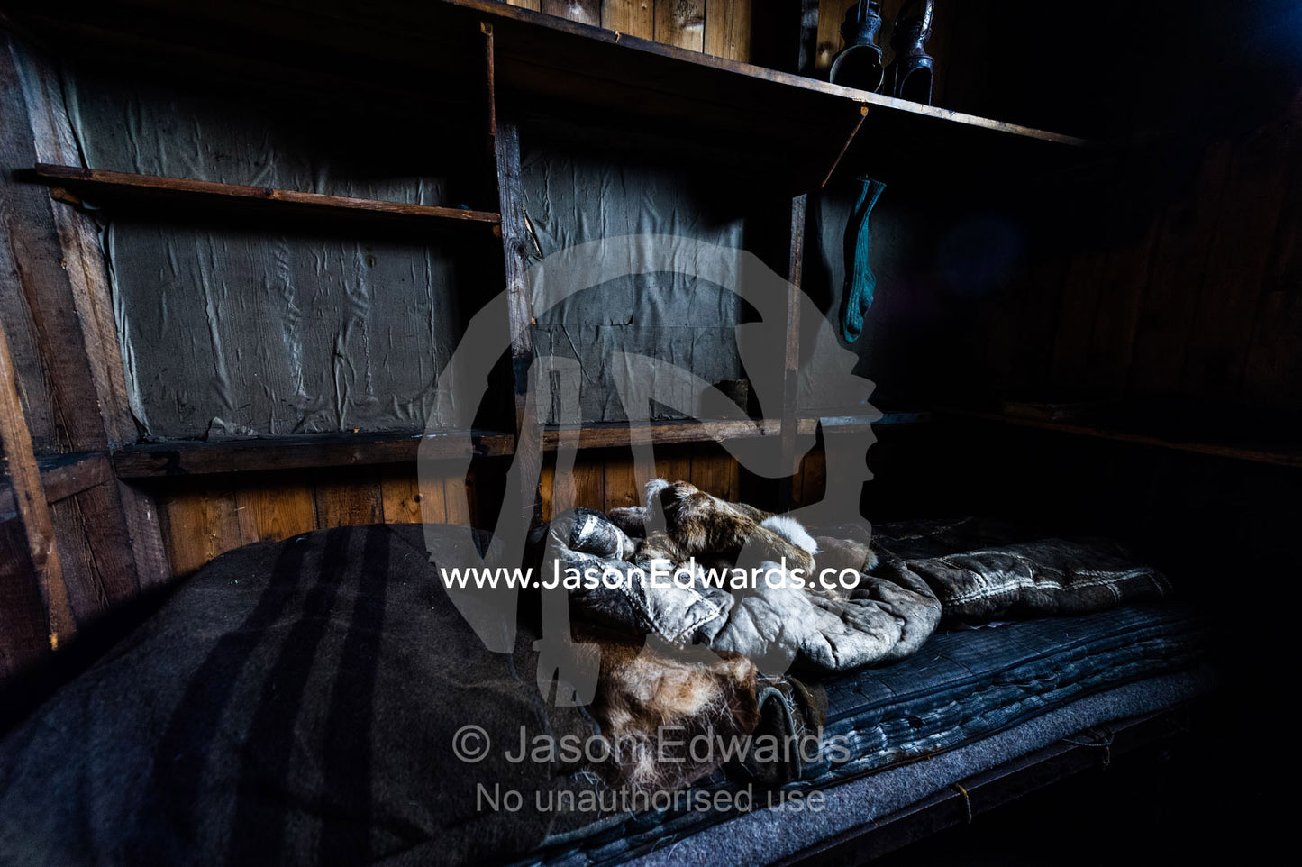 Animal furs and blankets on the bed of Antarctic explorer Robert Falcon Scott in his Antarctic hut. Scott's Hut, Cape Evans, Ross Island, Antarctica