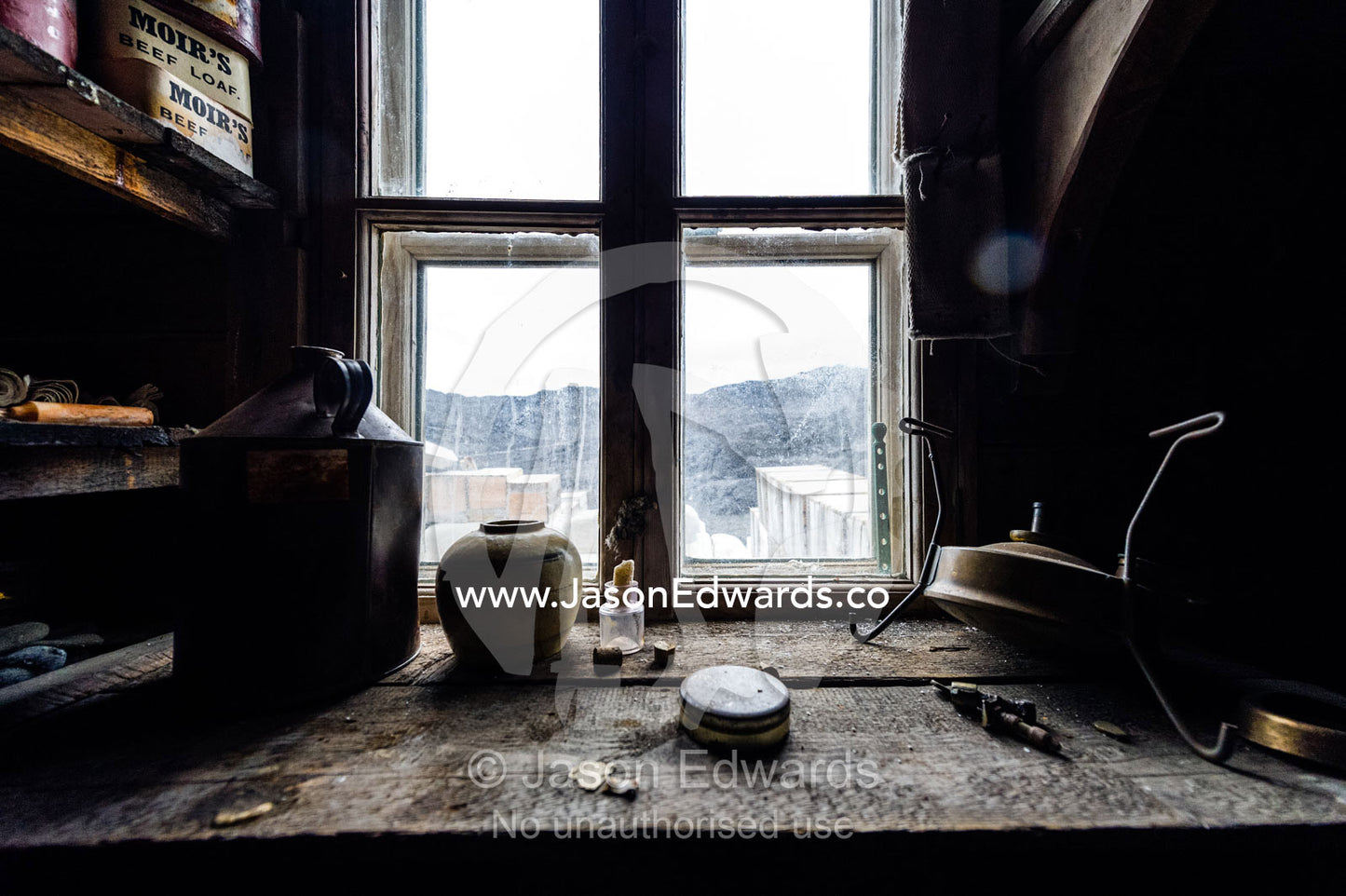 Artifacts and memorabilia on a windowsill in Antarctic explorer Ernest Shackleton's hut. Shackleton's Hut, Cape Royds, Ross Island, Antarctica.