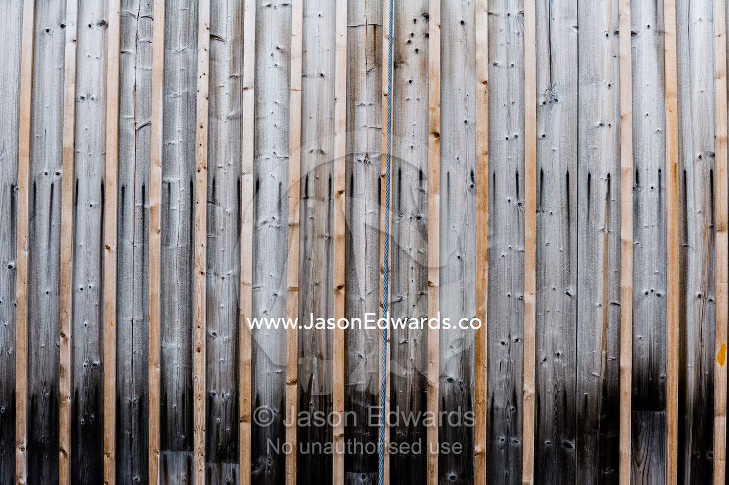 The textured weathered timber wall panels on the Antarctic explorer Ernest Shackleton's hut. Shackleton's Hut, Cape Royds, Ross Island, Antarctica.