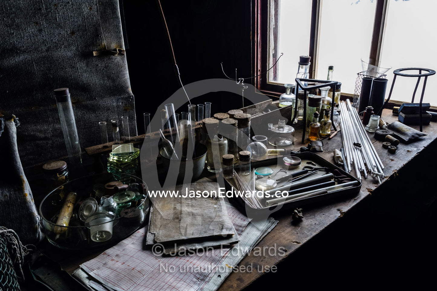 Glass pipettes, beakers and other scientific experiment equipment in the hut of Antarctic explorer Robert Falcon Scott. Scott's Hut, Cape Evans, Ross Island, Antarctica.