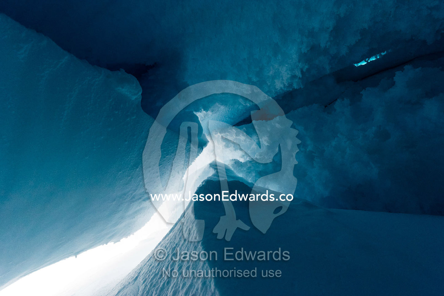 The frozen ceiling and icy walls of an ice cave in the Erebus Glacier Tongue. Erebus Ice Caves, Mount Erebus, Ross Island, Antarctica.