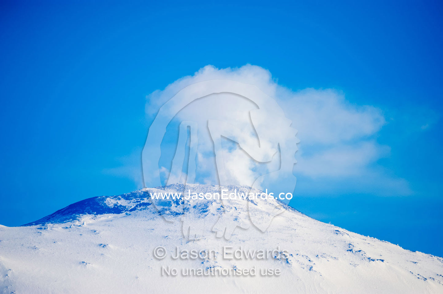The smoking summit of Mount Erebus an active volcano in Antarctica. Mount Erebus, Ross Island, Antarctica.
