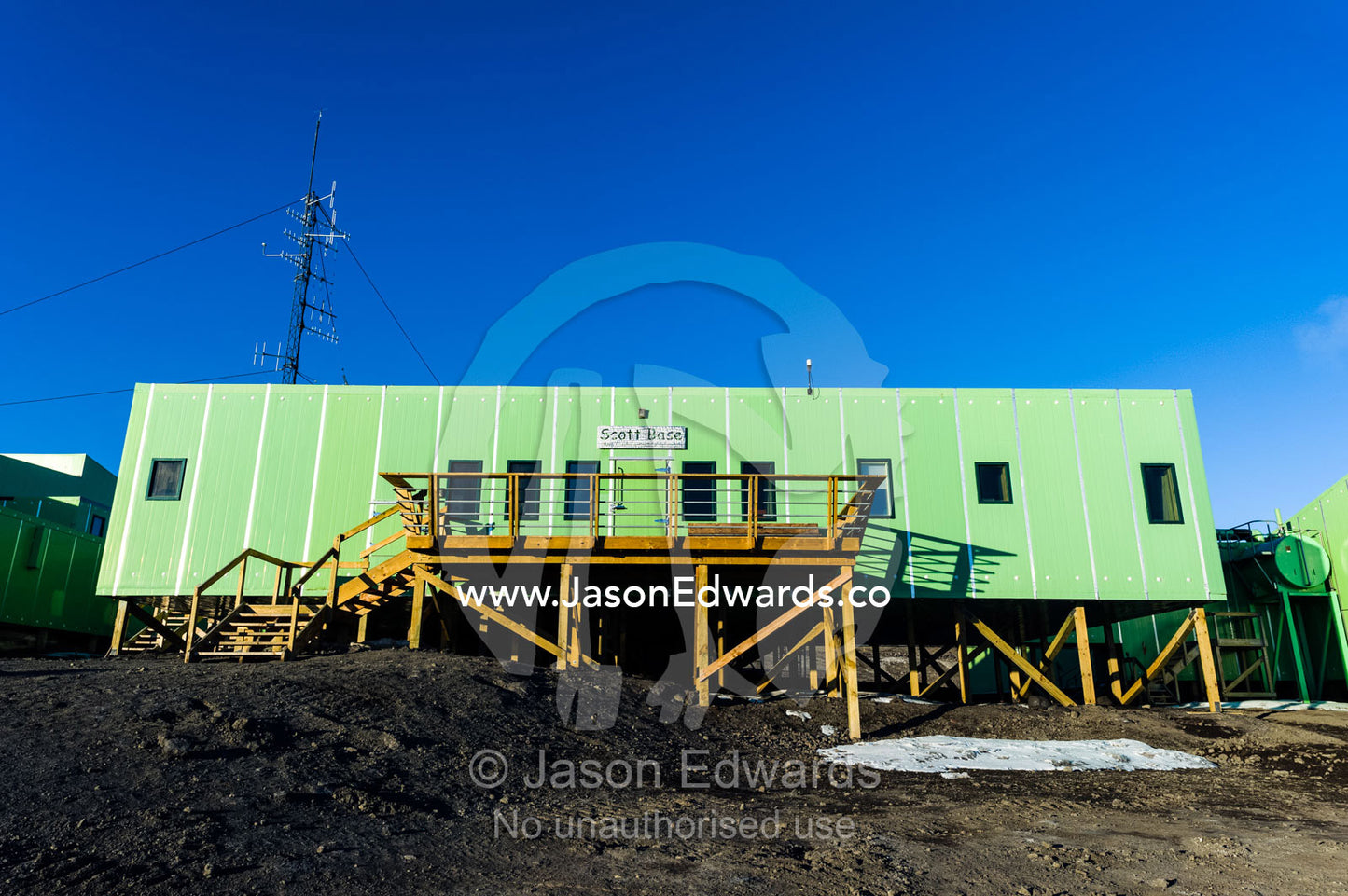 The green facade of the office complex of Scott Base in Antarctica. Scott Base, Pram Point, Hut Point Peninsula, Ross Island, Antarctica.