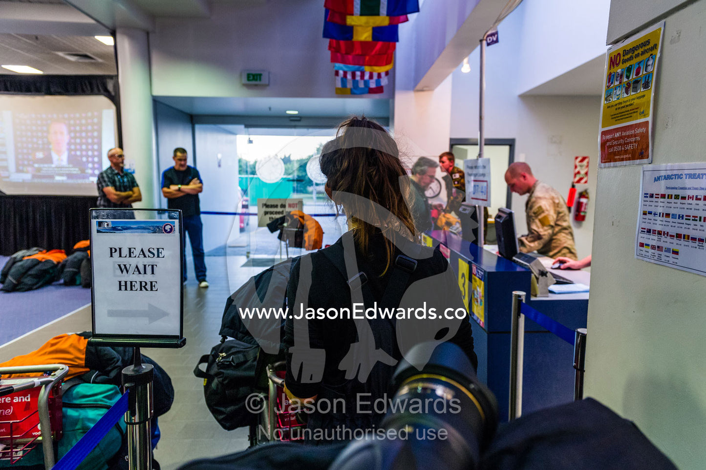 Scientists waiting to clear customs to fly to Antarctica. Antarctica New Zealand, Christchurch, New Zealand.