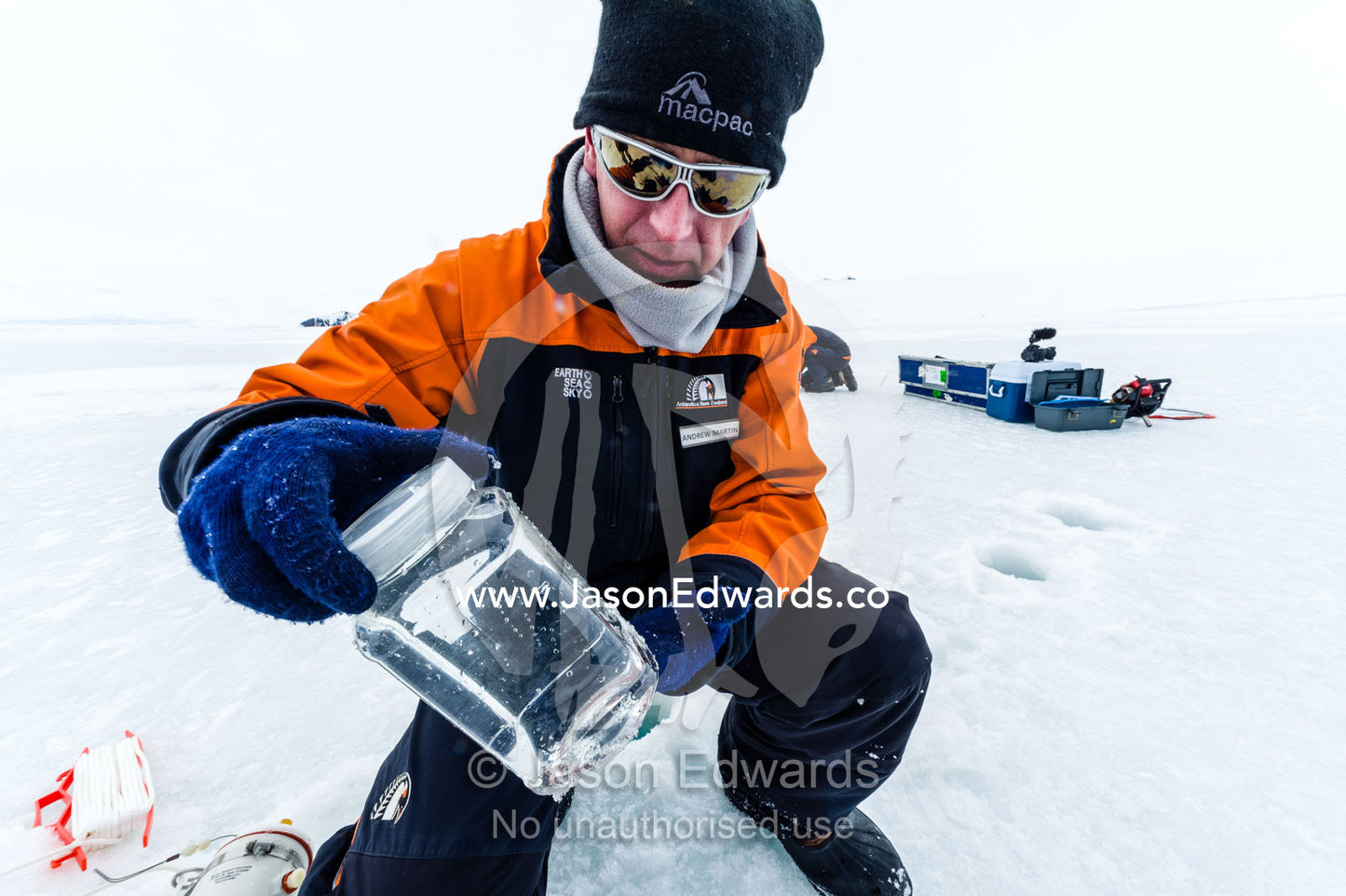 Researchers drill core samples from the sea ice to collect extremophiles from the ocean beneath the ice to study. Turtle Rock, Erebus Bay, McMurdo Sound, Ross Island, Antarctica.