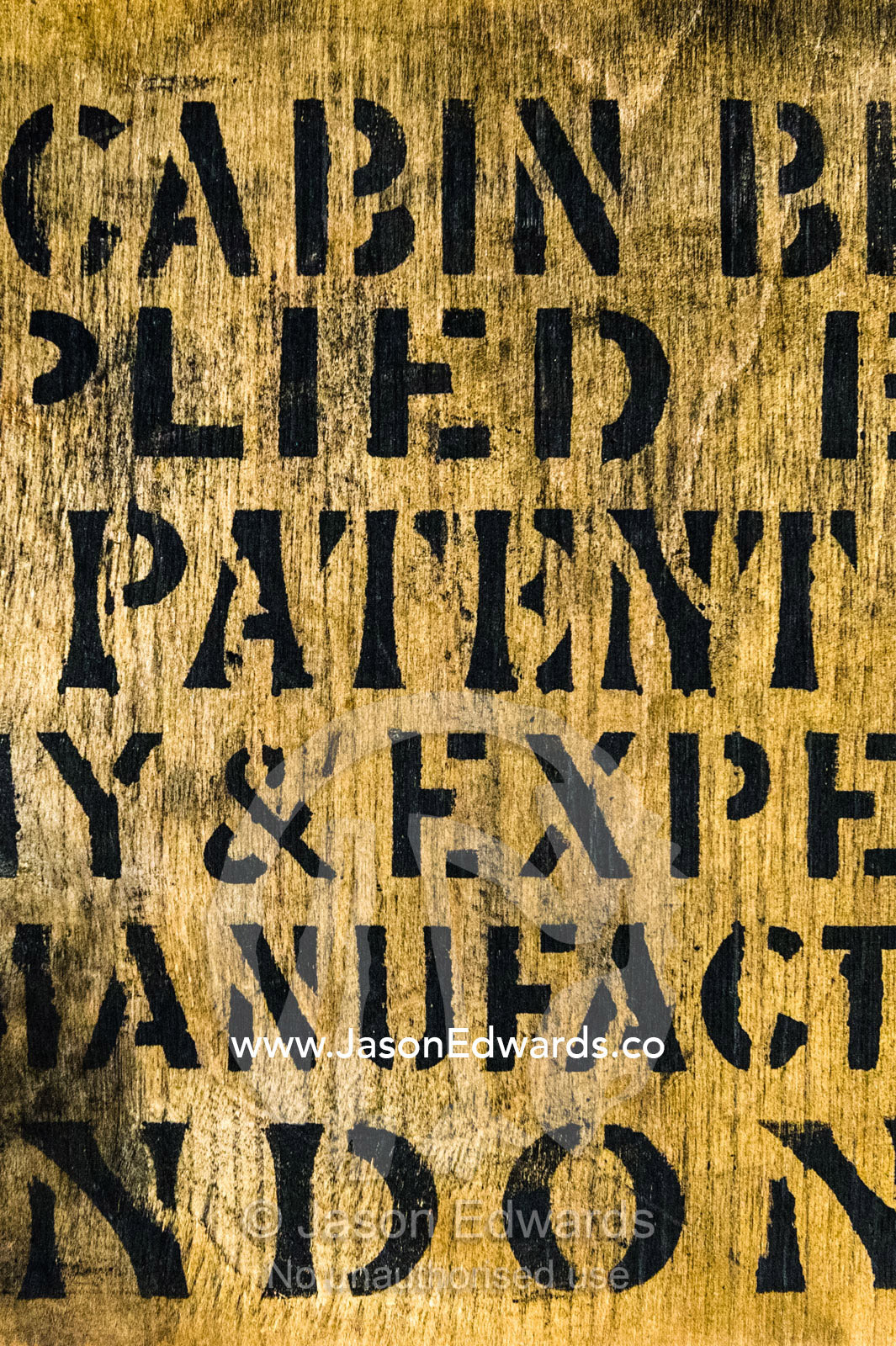 Ink printing on an antique timber box of explorers biscuits preserved in Discovery Hut in Antarctica. Discovery Hut, Hut Point, Ross Island, Antarctica.