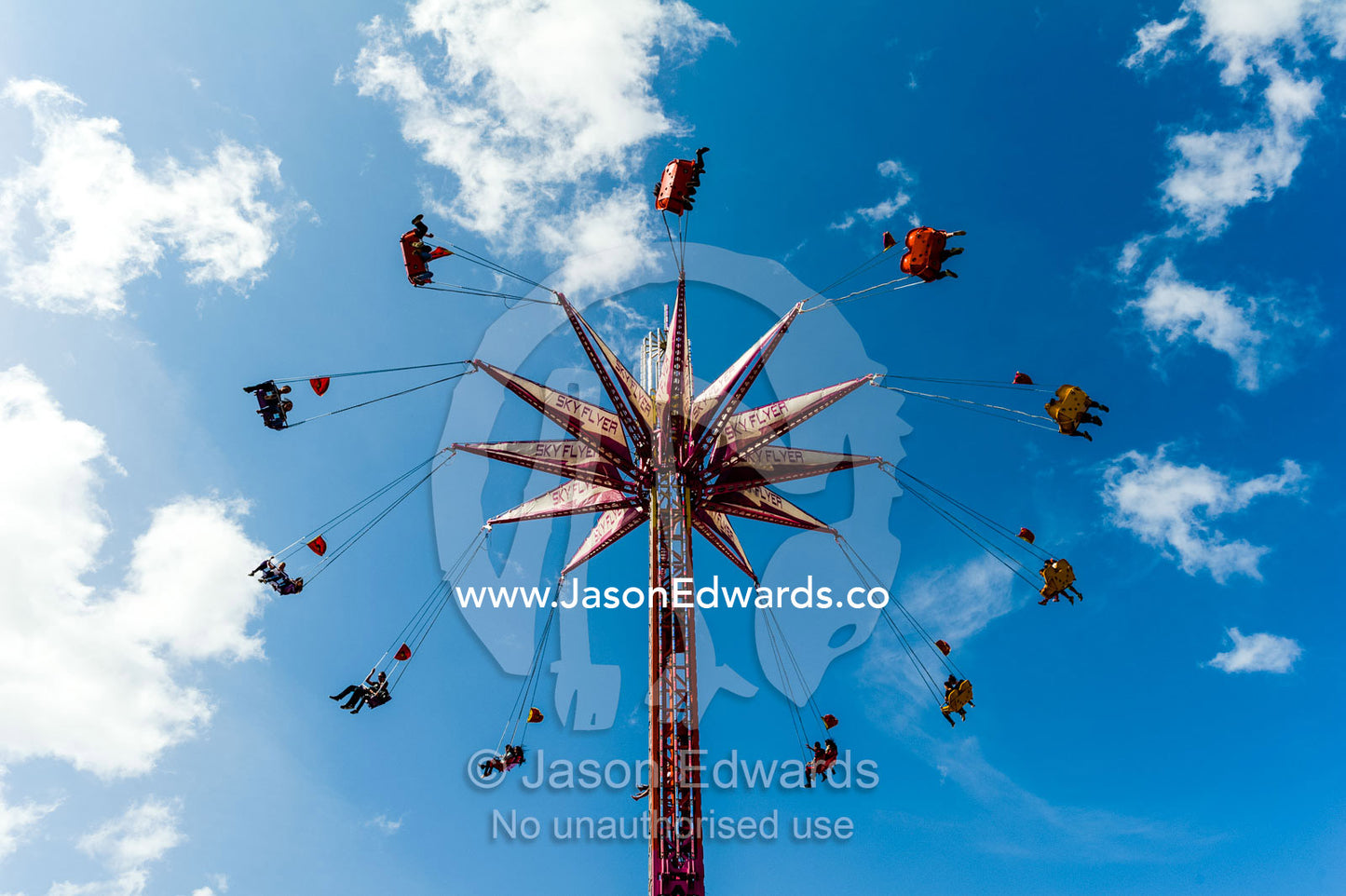 A scary sideshow attraction high in the sky at an agricultural show. Royal Melbourne Show, Flemington, Melbourne, Victoria, Australia.