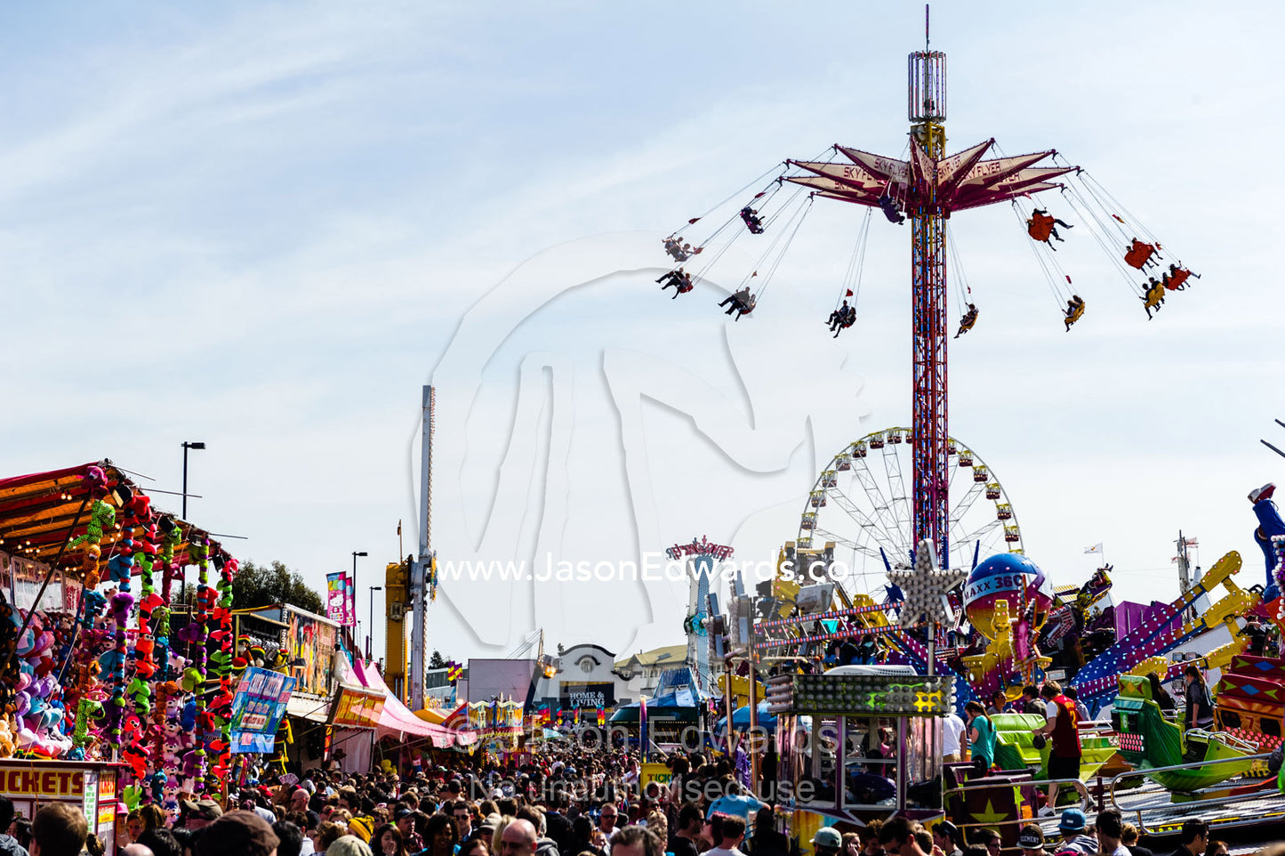 Scary sideshow attractions and arcade games at an agricultural show. Royal Melbourne Show, Flemington, Melbourne, Victoria, Australia.