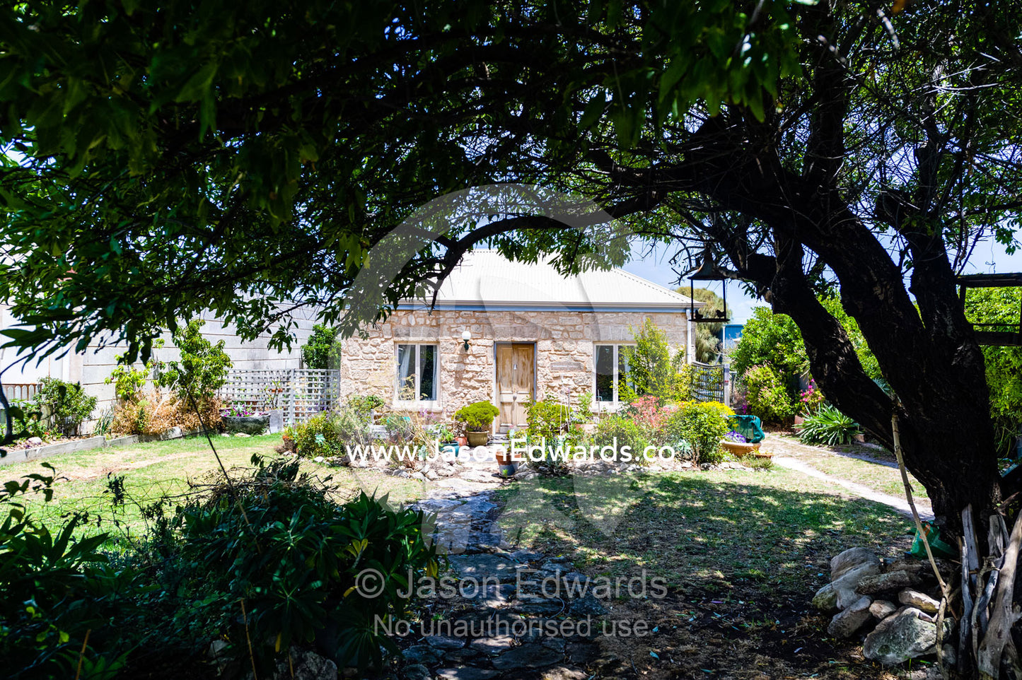 A beautiful limestone cottage and garden in a rural town. Robe, Limestone Coast, South Australia, Australia.
