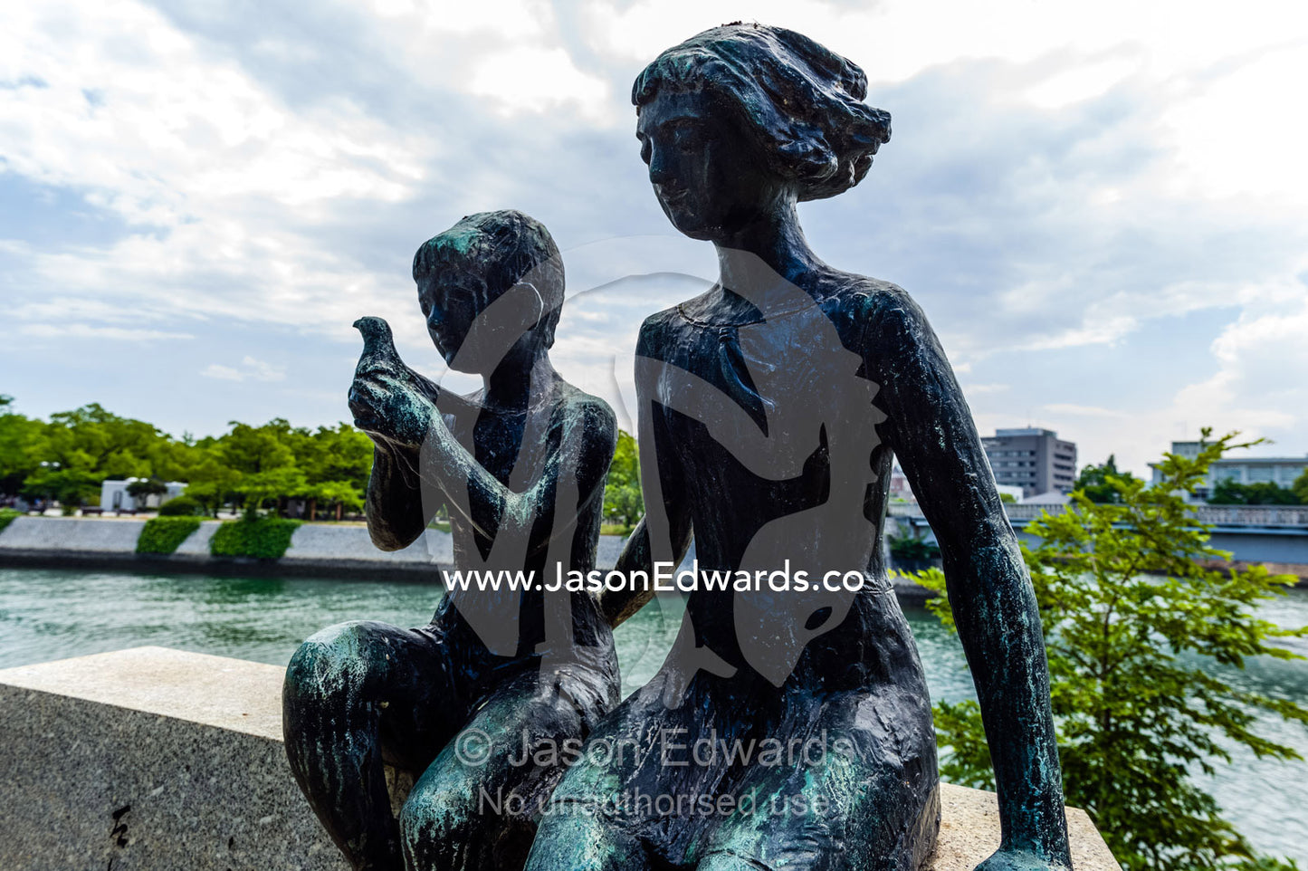 A memorial to Japanese novelist Miekichi Suzuki at Ground Zero in Hiroshima. Hiroshima Peace Memorial Park, Hiroshima, Honshu Island, Japan.