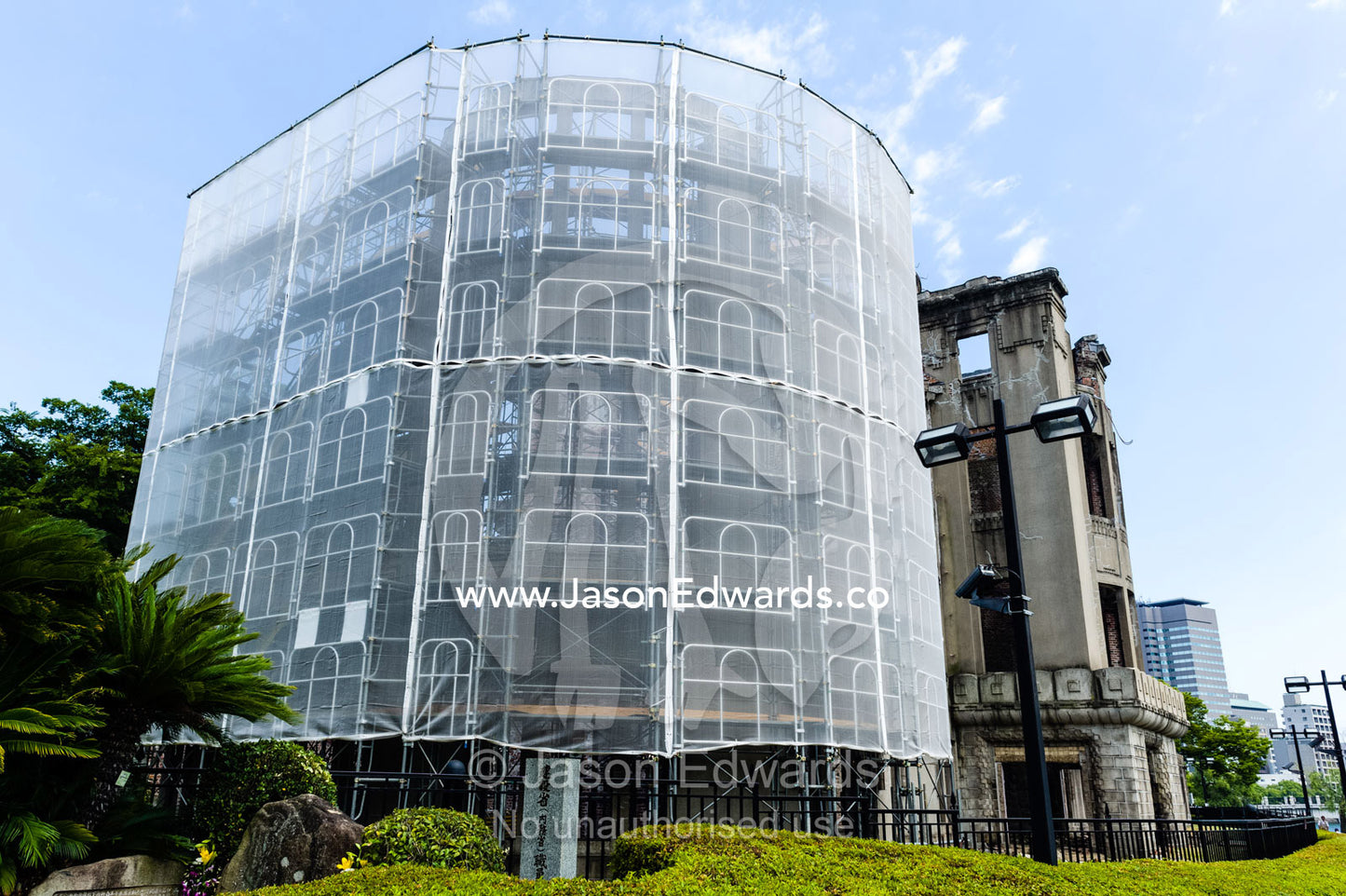 Renovations on the ruin of the Hiroshima Prefectural Industrial Promotion Hall known as the Atomic Bomb Dome or Genbaku Dōmu. Hiroshima Peace Memorial Park, Hiroshima, Honshu Island, Japan.