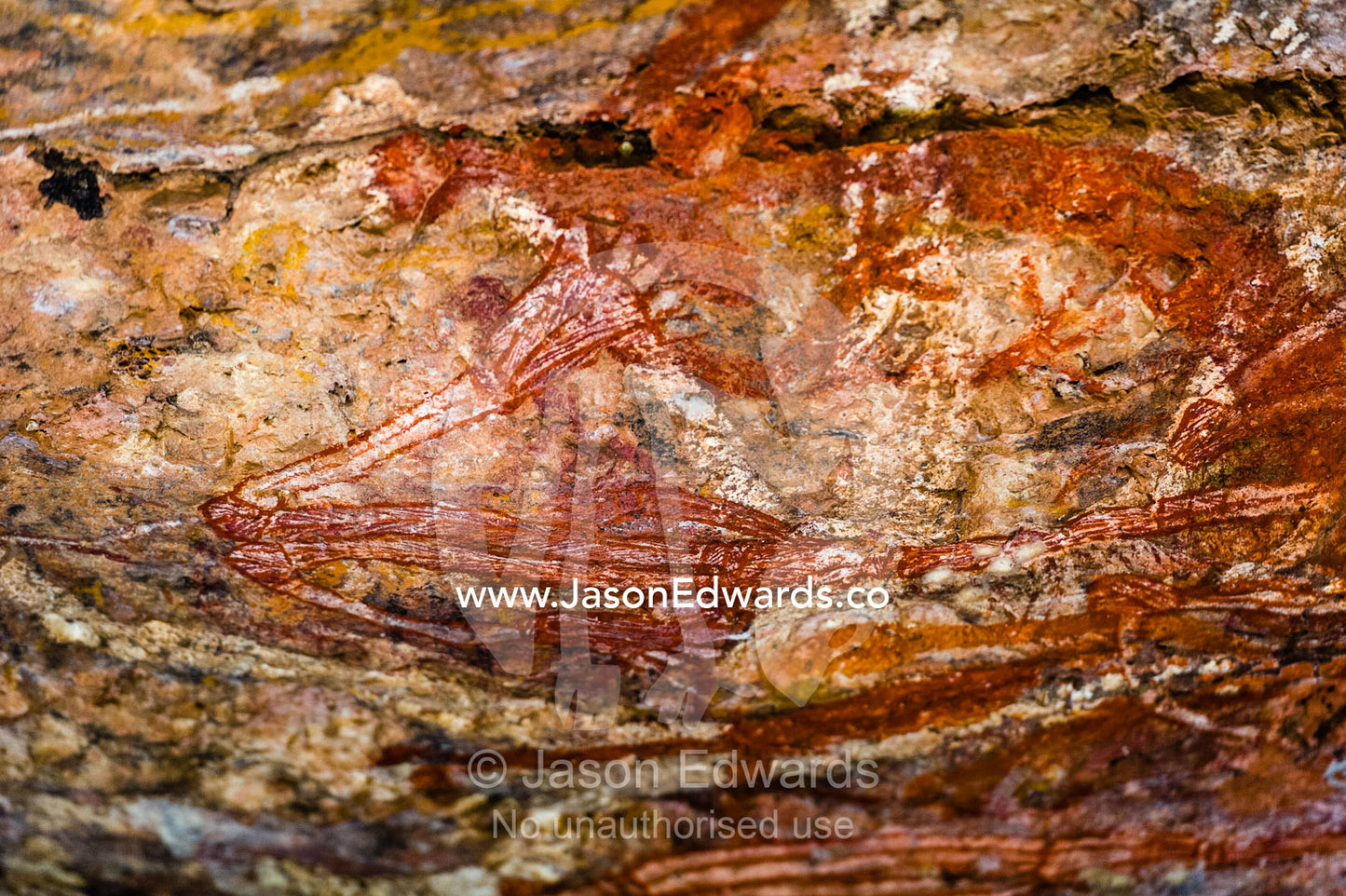 Ancient Aboriginal rock painting art in an incline. Burrunggui, Nourlangie Rock, Arnhem Land, Kakadu National Park, Northern Territory, Australia.