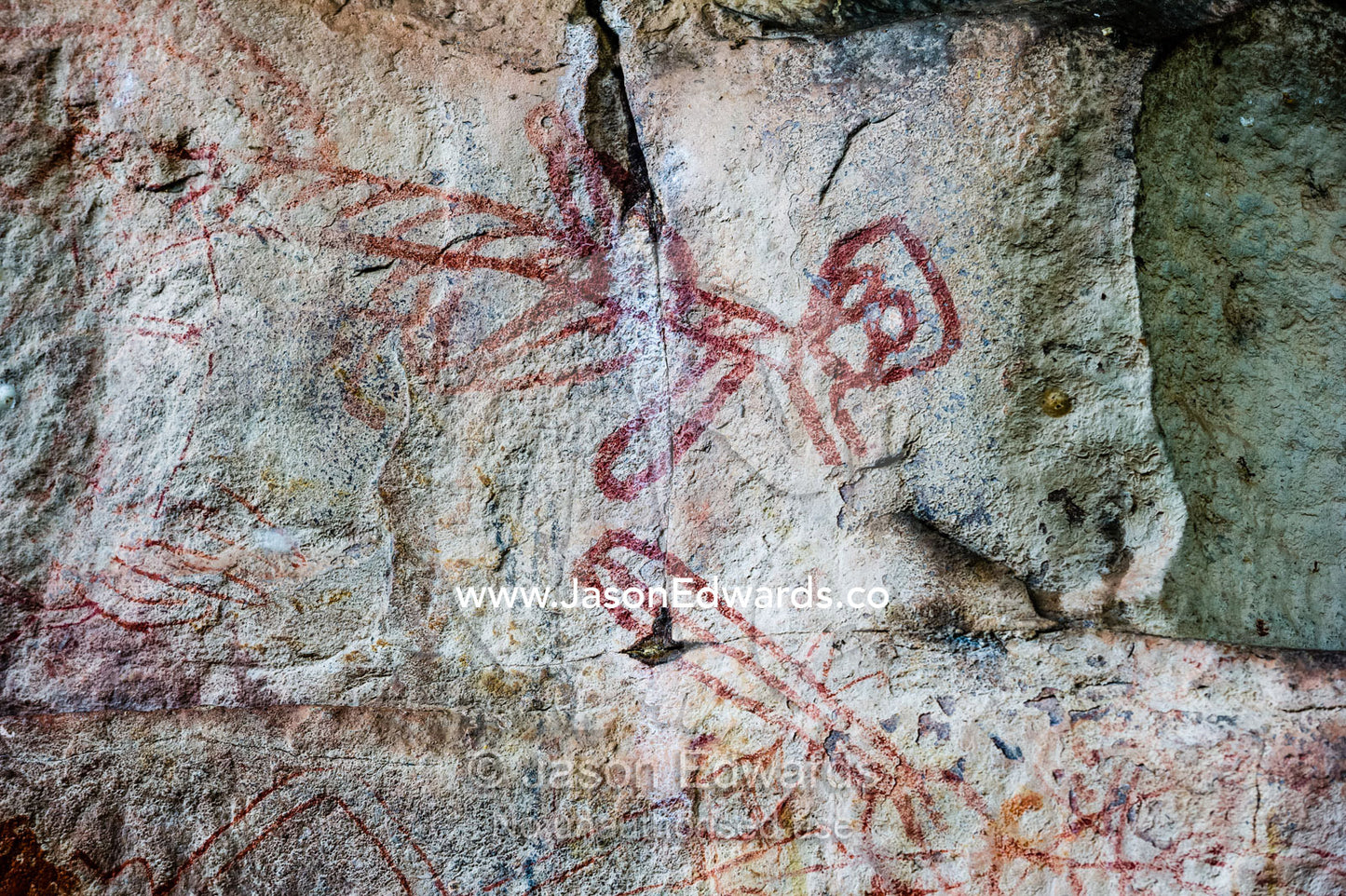 An Aboriginal rock painting art gallery featuring a female figure. Ubirr, Kakadu National Park, Northern Territory, Australia.