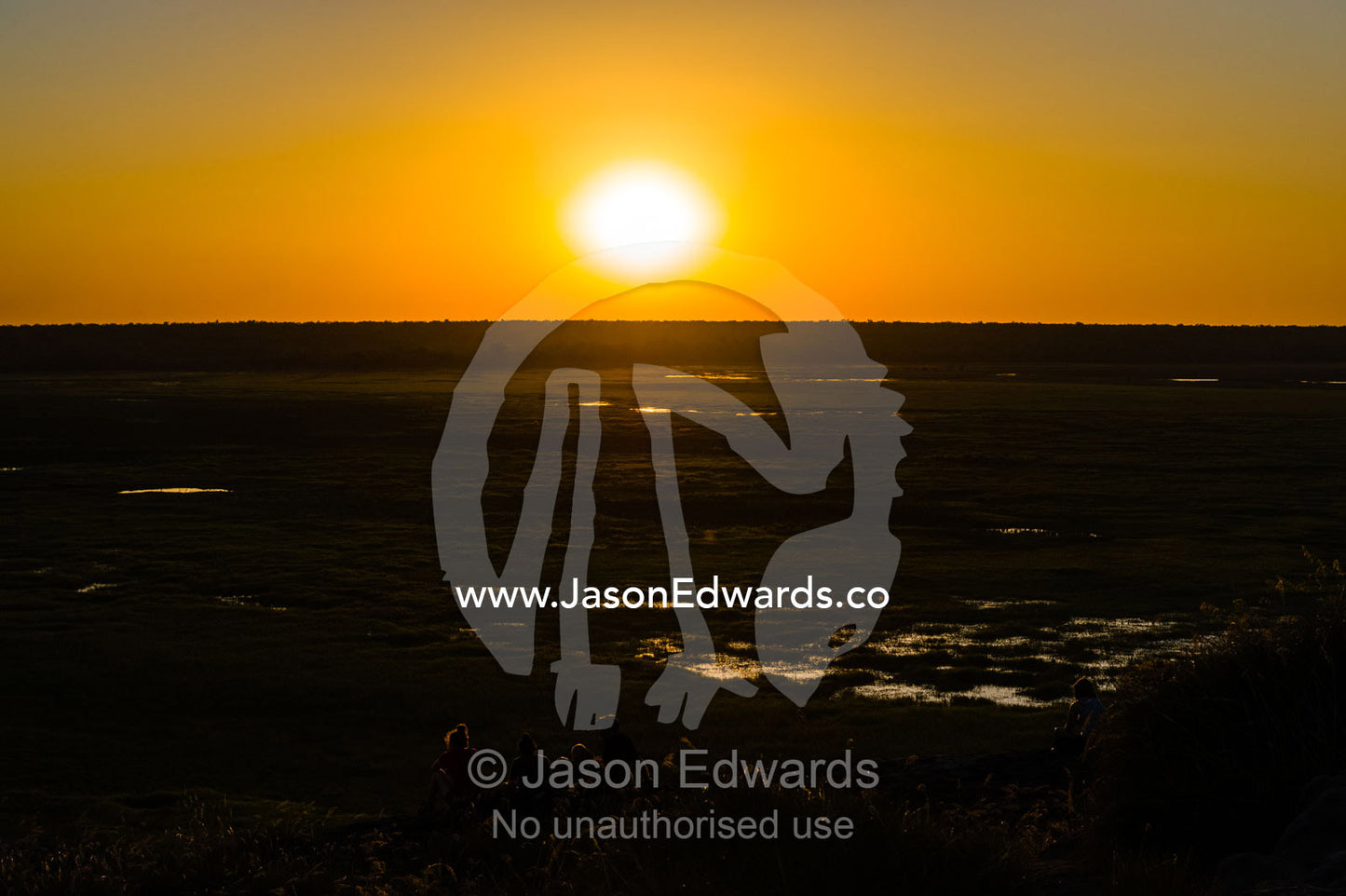 Sunset falls over a vast floodplain in the Top End, . Ubirr, Nadab floodplain, Kakadu National Park, Northern Territory, Australia.