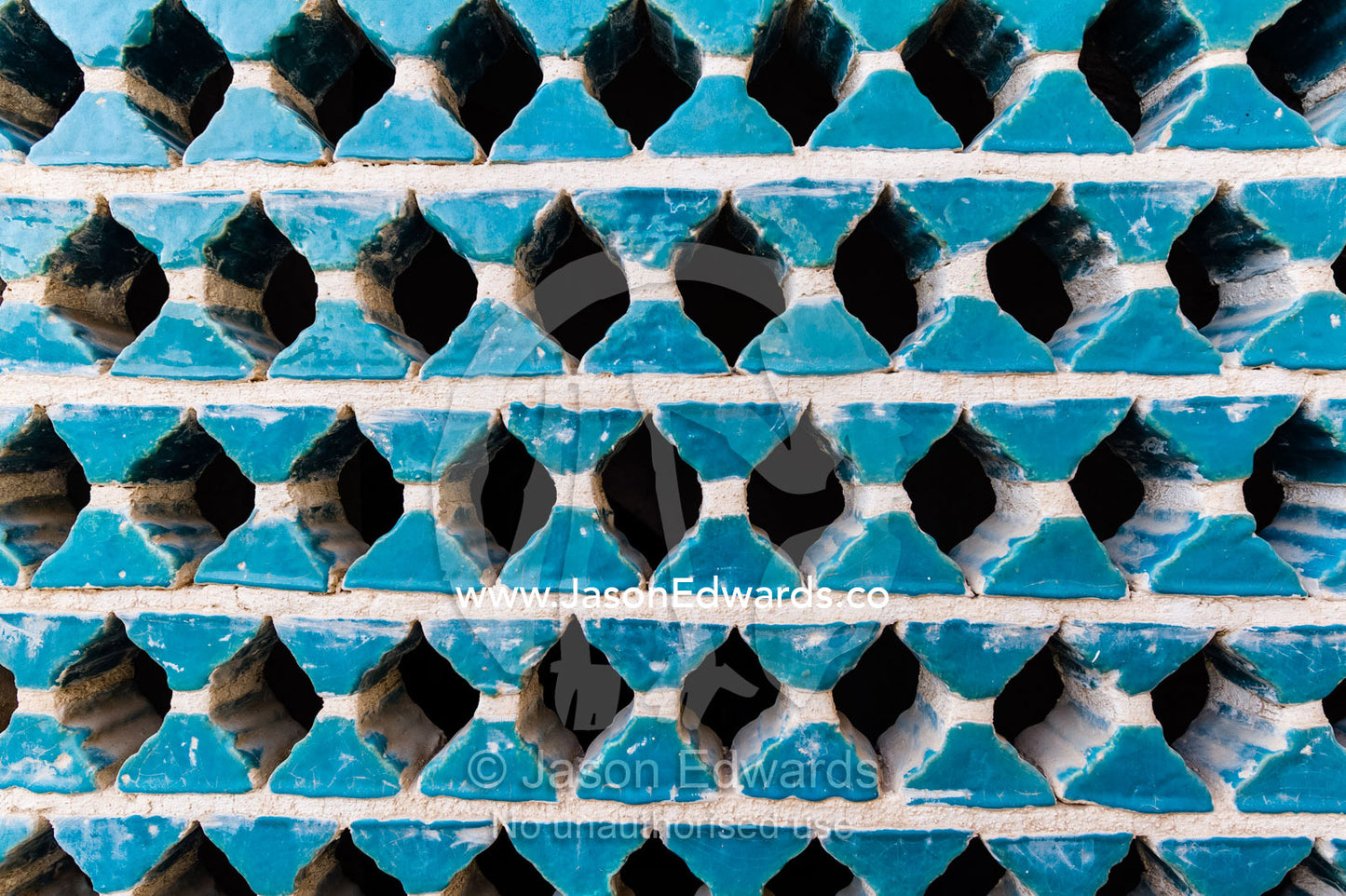 Blue ceramic lattice windows in a wealthy merchant's home. Borujerdis House, Kashan, Isfahan Province, Islamic Republic of Iran.