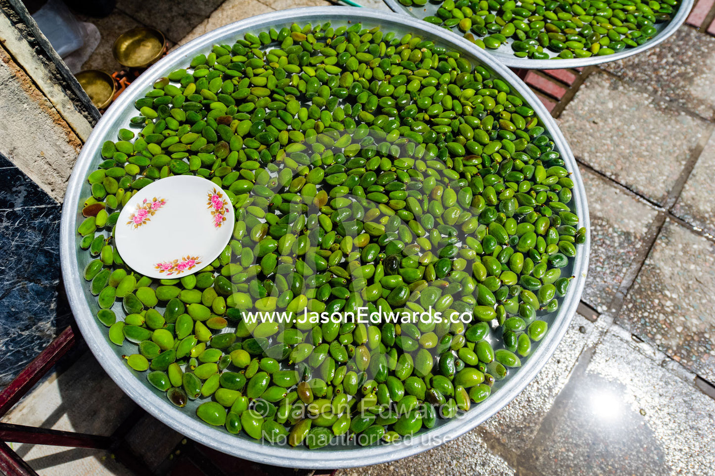 Fresh green Almonds on sale during March and April for Nowruz Iranian New Year. Saraye Moshir, Shiraz, Islamic Republic of Iran.