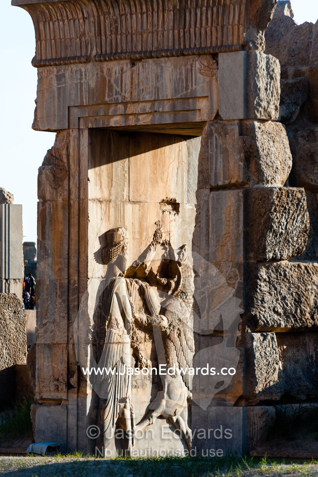 A frieze of the King carved into the stone at the entrance gate to the Palace of 100 Columns. Persepolis, Shiraz, Fars Province, Islamic Republic of Iran.