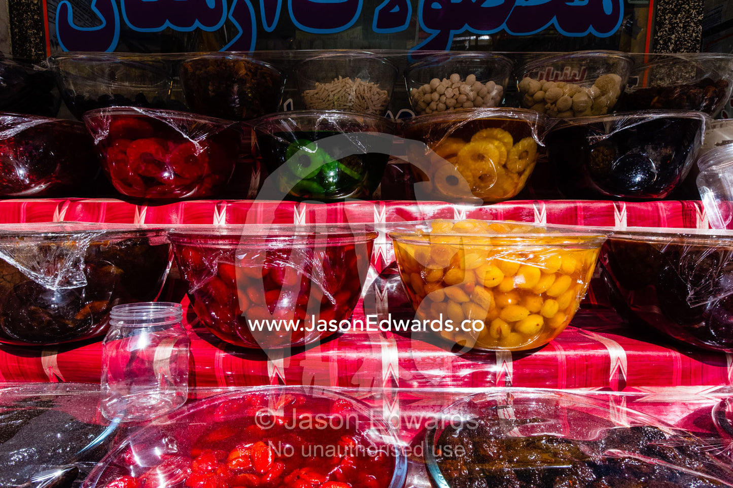 Pickle jars of plum and apricot in a village market. Niasar, Neyasar District, Kashan County, Isfahan Province, Islamic Republic of Iran.