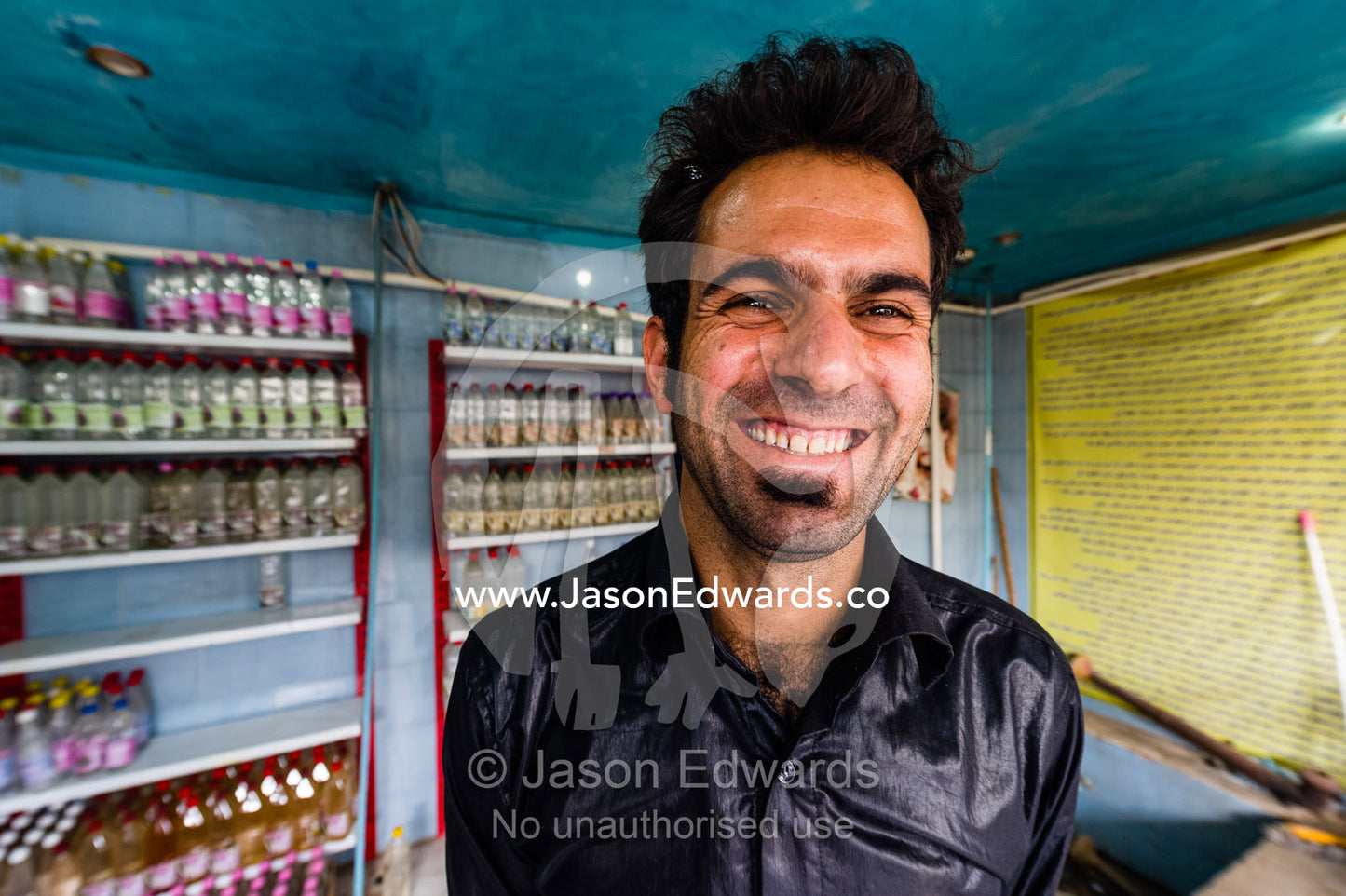 The beaming face of the owner of a Rose water workshop. Niasar, Neyasar District, Kashan County, Isfahan Province, Islamic Republic of Iran.