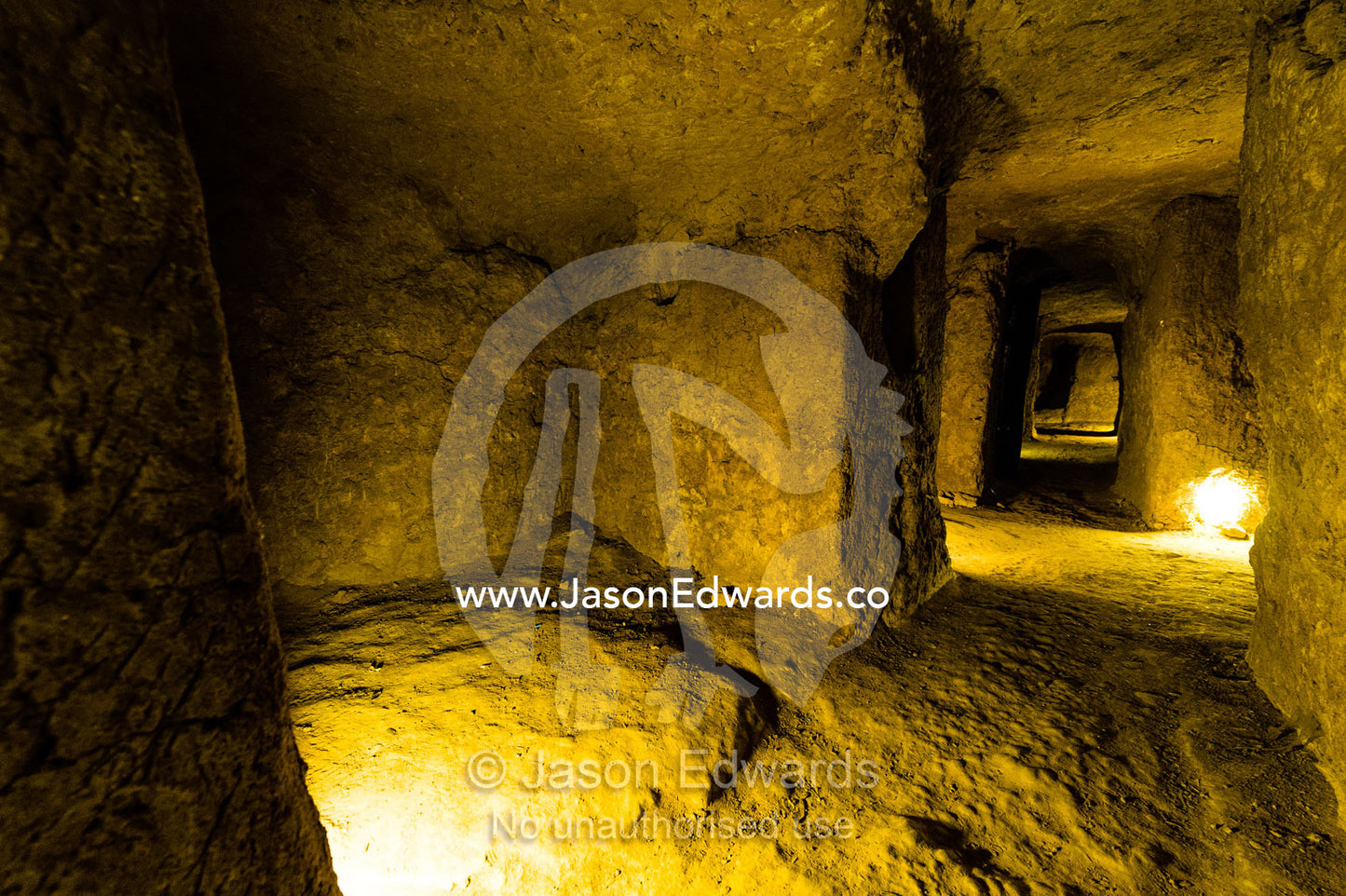 Tunnels and rooms carved into the rock to form an ancient underground city used for defense. Ouyi, Noushabad, Kashan, Isfahan province, Islamic Republic of Iran.