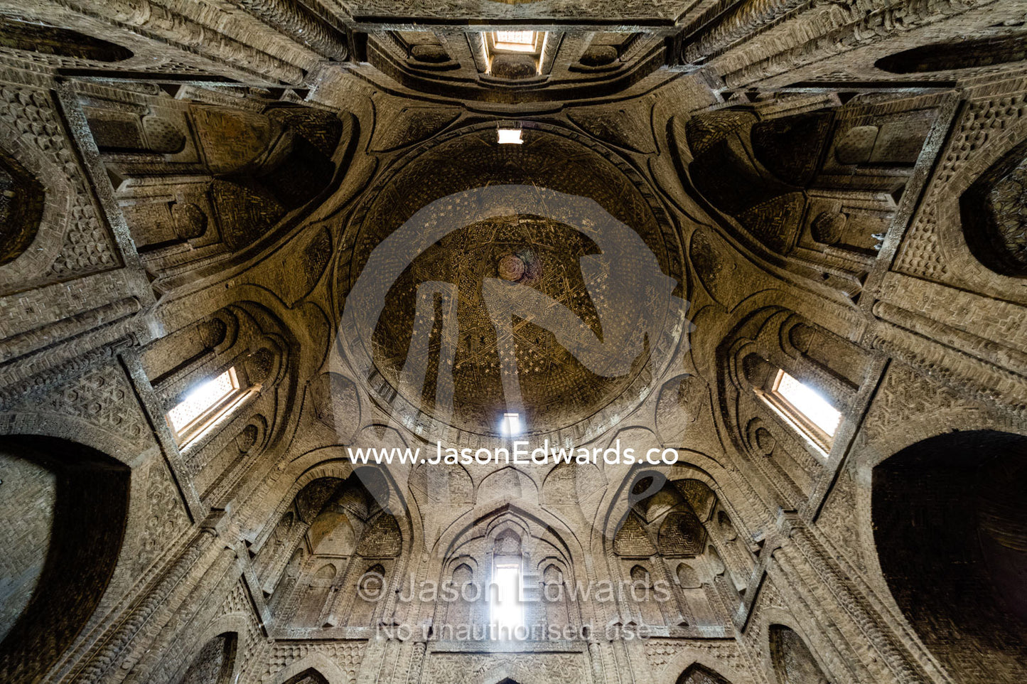 The cavernous, vaulted and domed ceiling of the Jameh Mosque in Iran. Jameh Mosque of Isfahan, Isfahan, Isfahan Province, Islamic Republic of Iran.