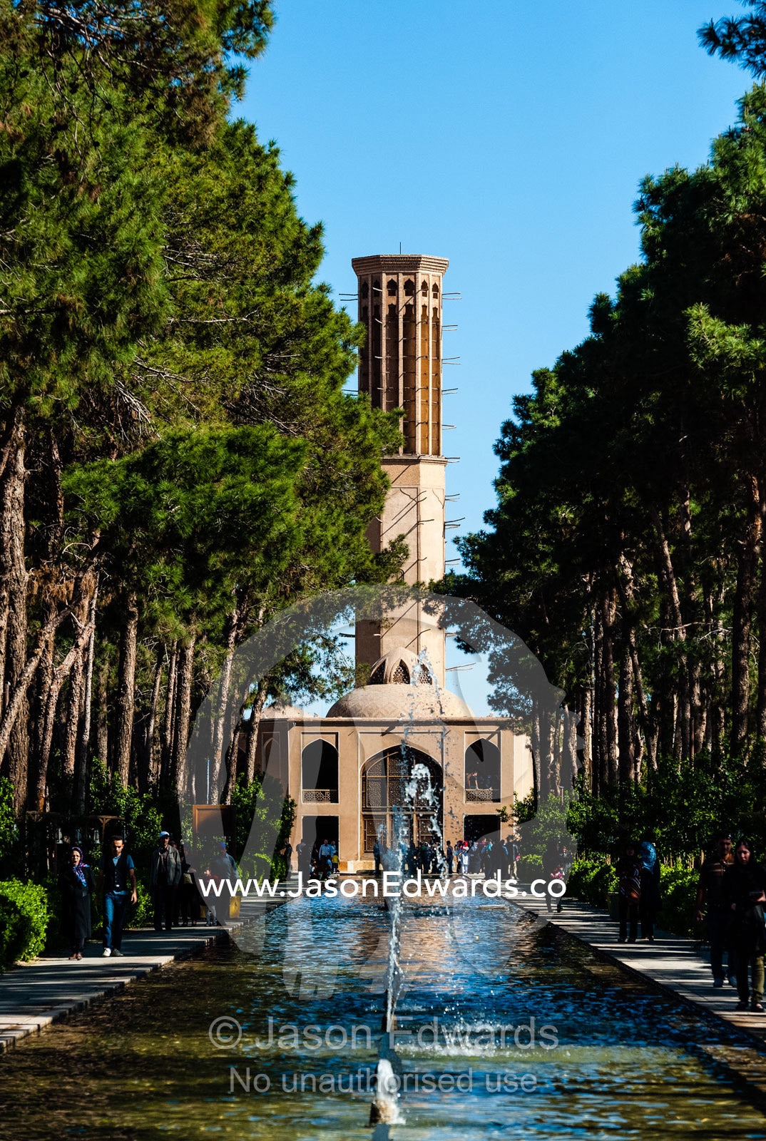 A windcatcher overlooks an ornamental pond in a traditional garden. Dowlat Abad Garden, Yazd, Yazd Province, Islamic Republic of Iran.