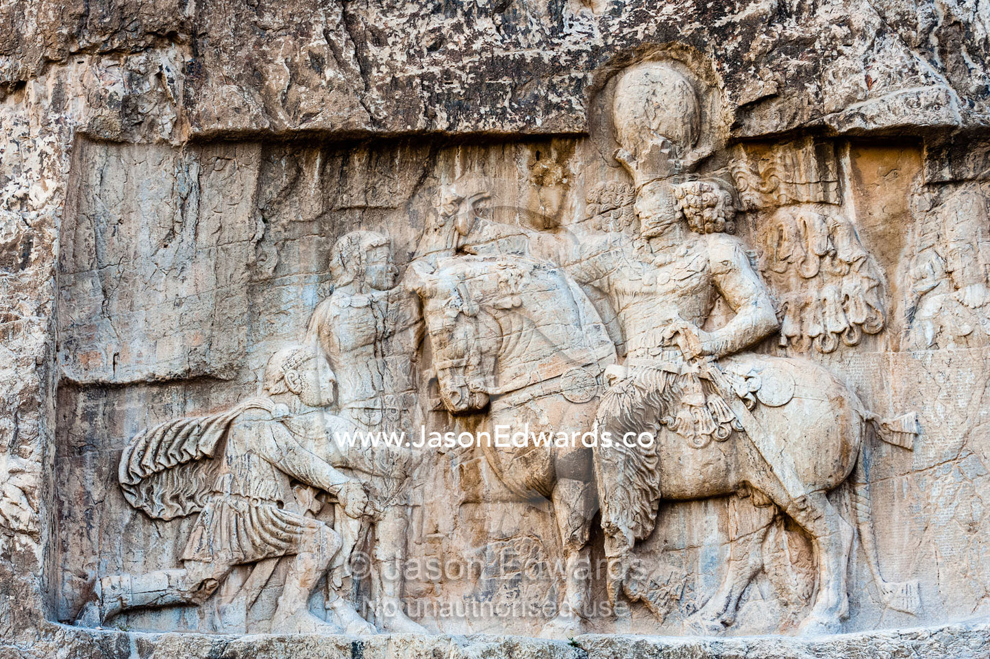 A carving of the Victory of King Shapour the 1st against Roman emperor Valerian at the archeological site of Naqsh-e Rustam also known as the Necropolis. Tombs of the Kings, Naqsh-e Rustam, Fars Province, Islamic Republic of Iran.