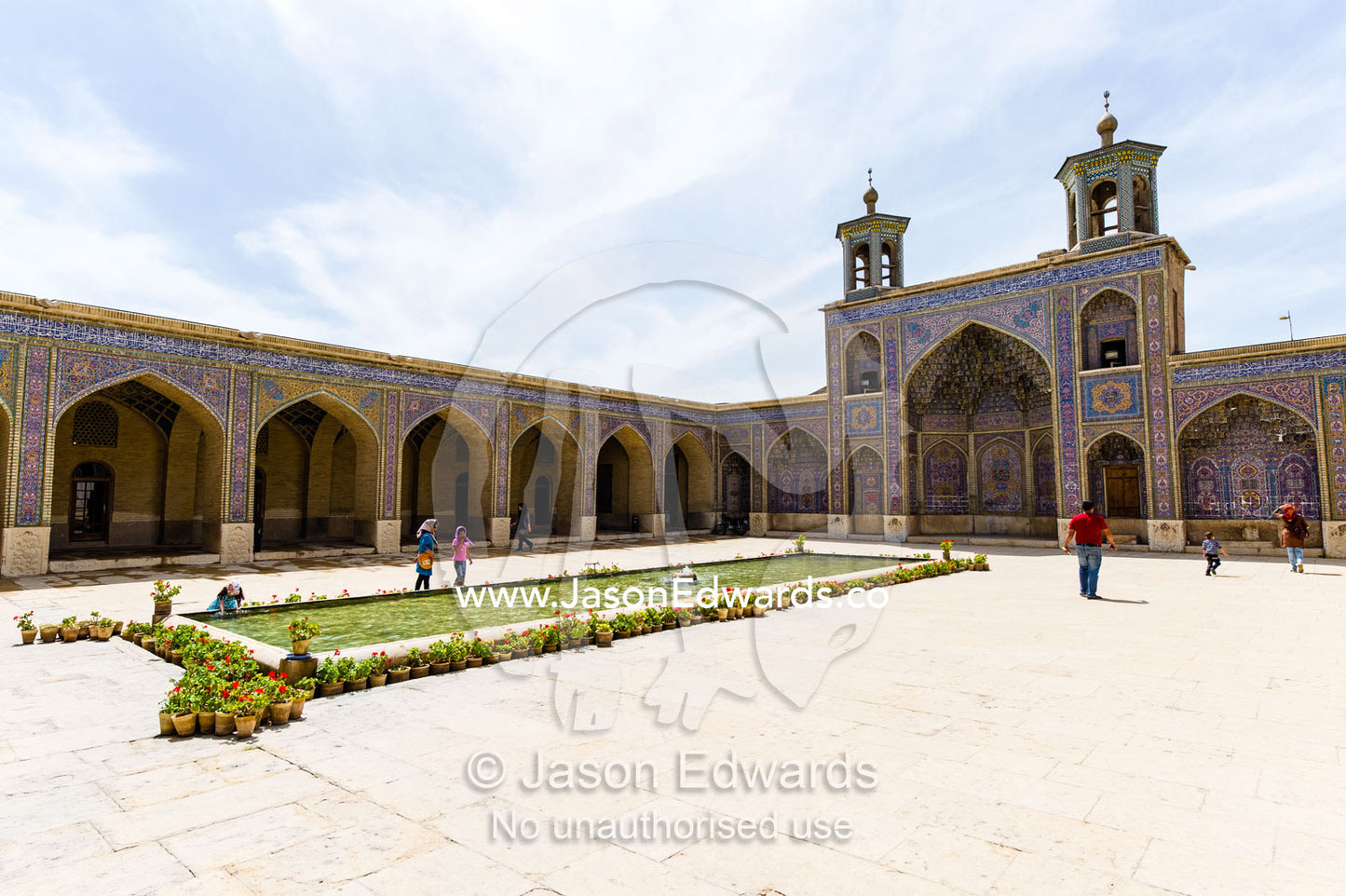 The main courtyard and riwaq in the Nasir ol Molk Mosque. Nasir ol Molk Mosque, Shiraz, Fars Province, Islamic Republic of Iran.