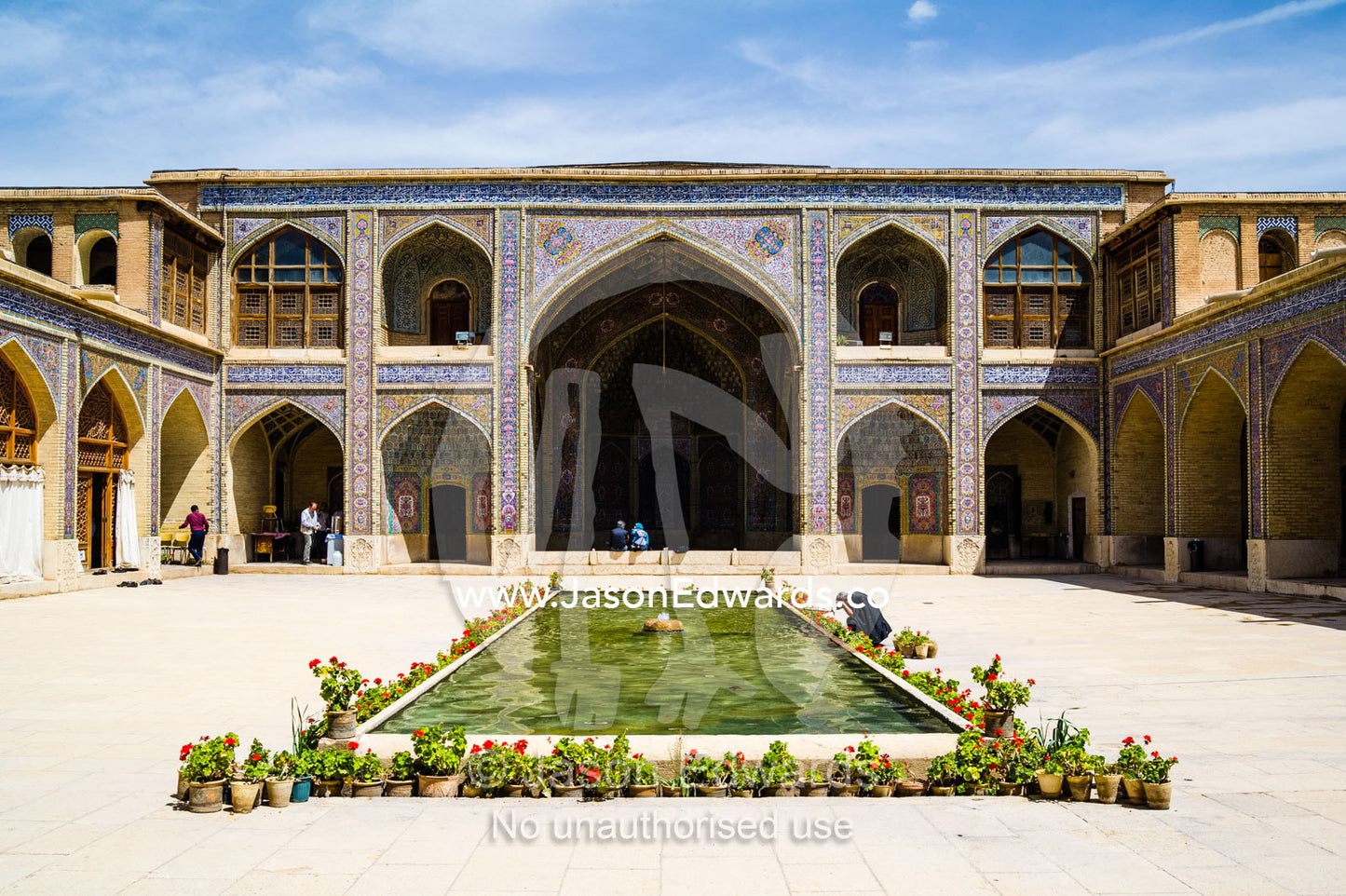The iwan and sahn, ornamental pond, of the Nasir ol Molk Mosque. Nasir ol Molk Mosque, Shiraz, Fars Province, Islamic Republic of Iran.