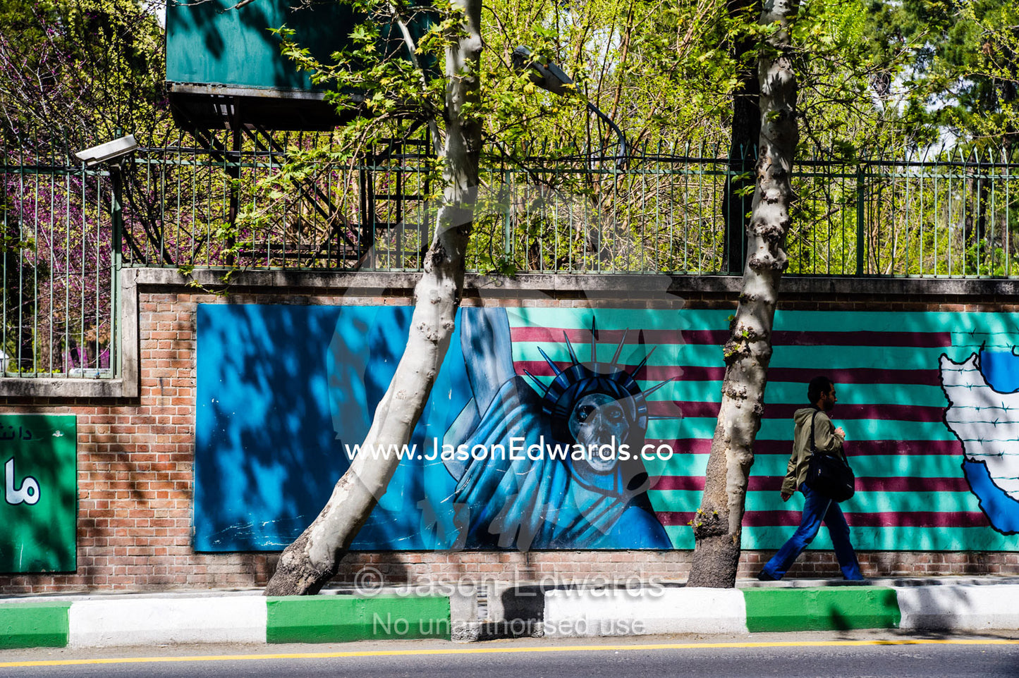 A painting of the Statue of Liberty as a skeleton on the wall of the ex-US Embassy in Tehran. Tehran, Tehran Province, Islamic Republic of Iran.