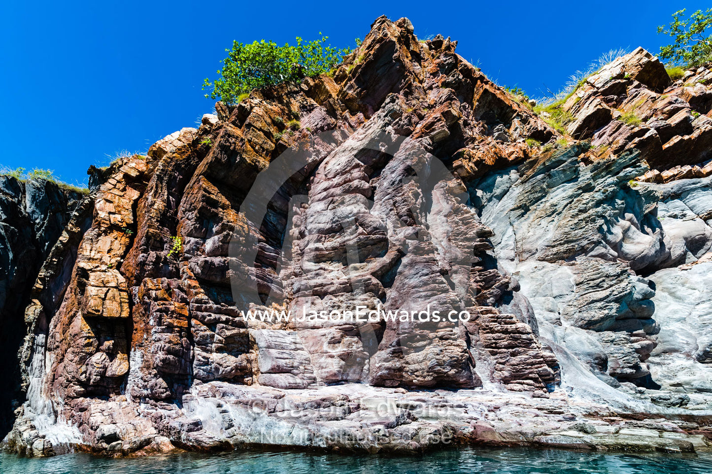 A series of sandstone Anticlines where folds in the rock happen under pressure. Nares Point, Cockatoo Island, Yampi Sound, Buccaneer Archipelago, Kimberley Coast, Western Australia, Australia.