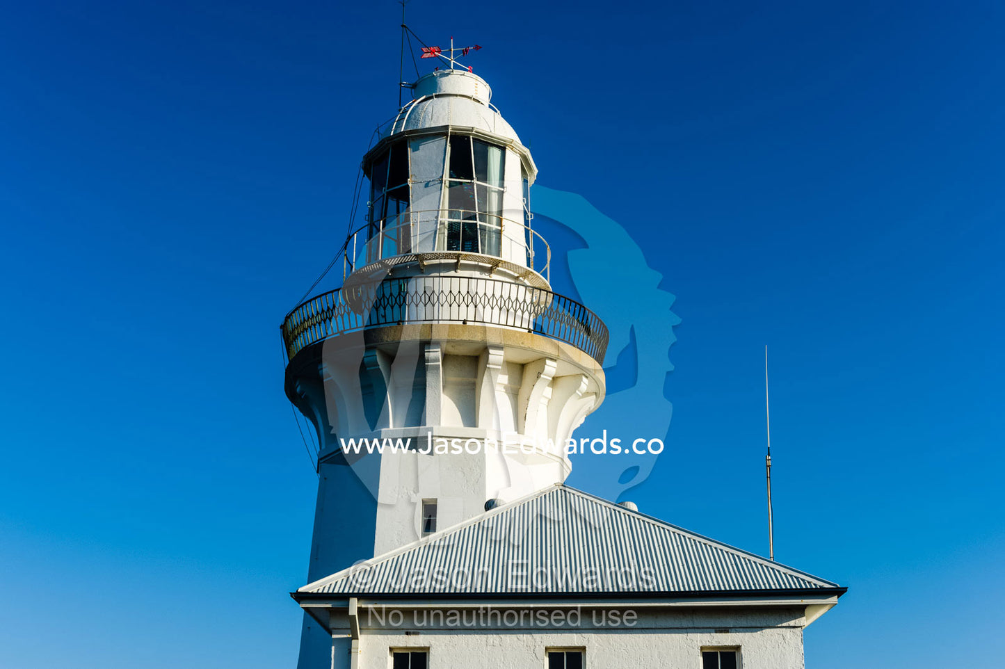 The lantern room, widows walk and cupola of a lighthouse. Smoky Cape Lighthouse, Hat Head National Park, New South Wales, Australia.