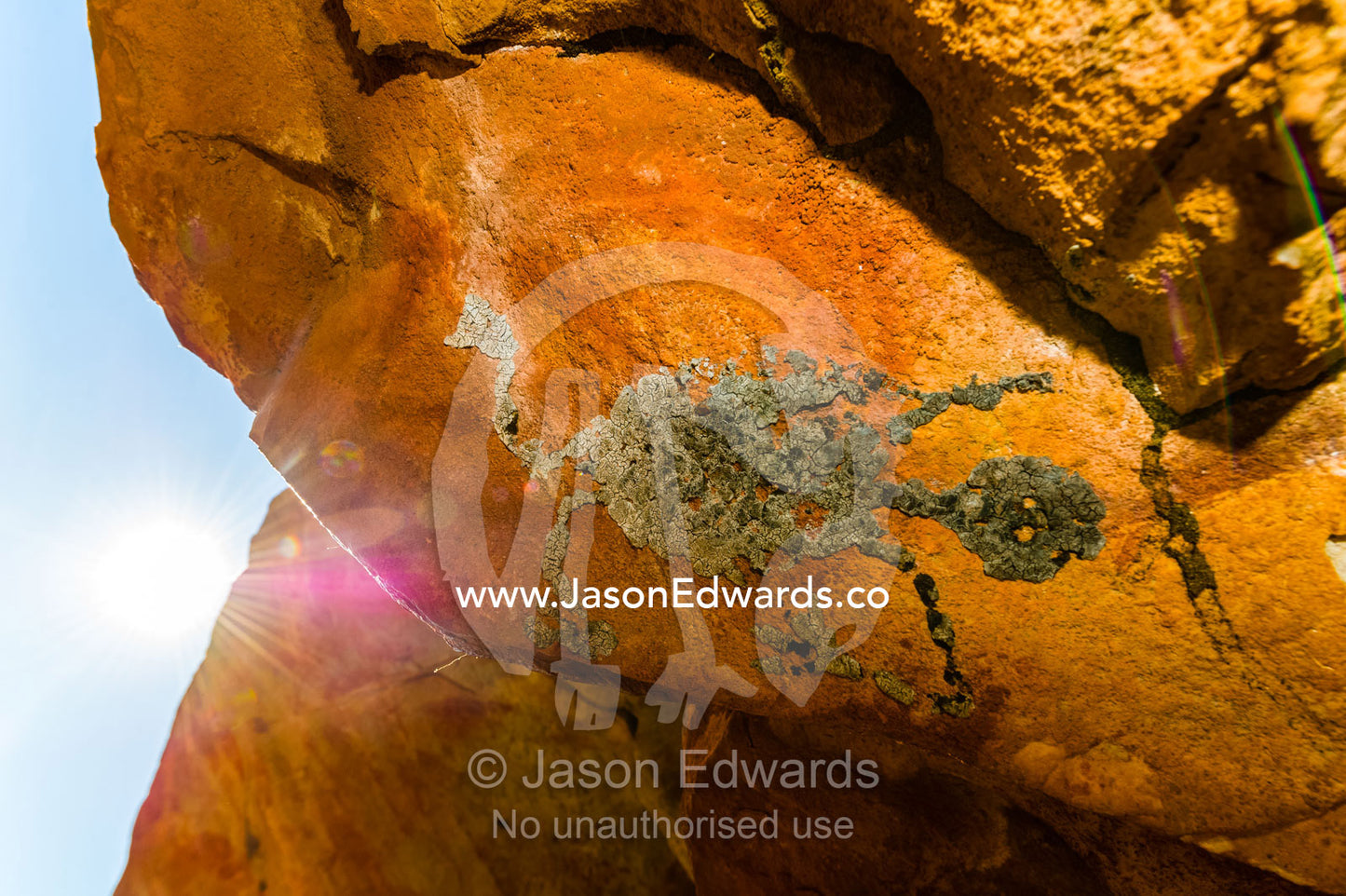 An ancient Aboriginal bees wax evil spirit on the ceiling of a sandstone cave. Raft Point, Doubtful Bay, Buccaneer Archipelago, Kimberley Coast, Western Australia, Australia.