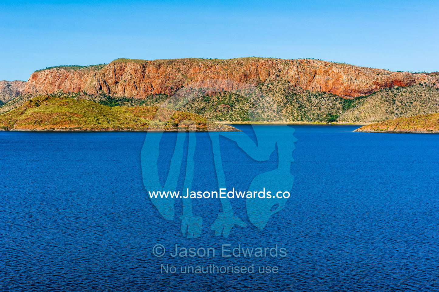 The enormous freshwater Lake Argyle surrounded by desert mountains. Ord River Dam, Lake Argyle, Kimberley Coast, Western Australia, Australia.
