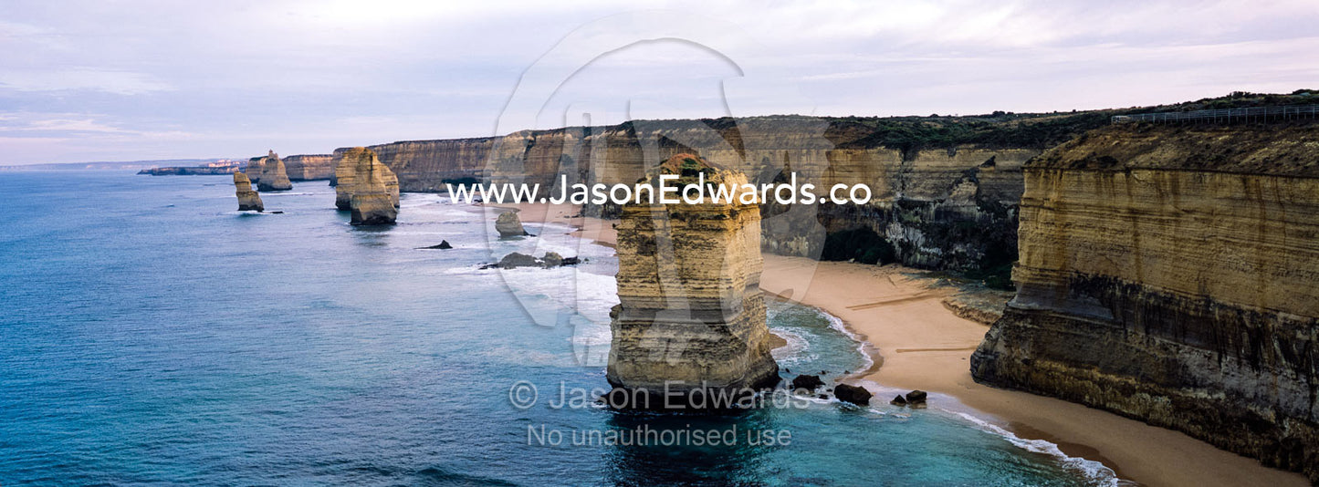 An aerial view of the sheer limestone cliffs and the Twelve Apostles pillars. Twelve Apostles, Port Campbell National, Great Ocean Road, Victoria, Australia.