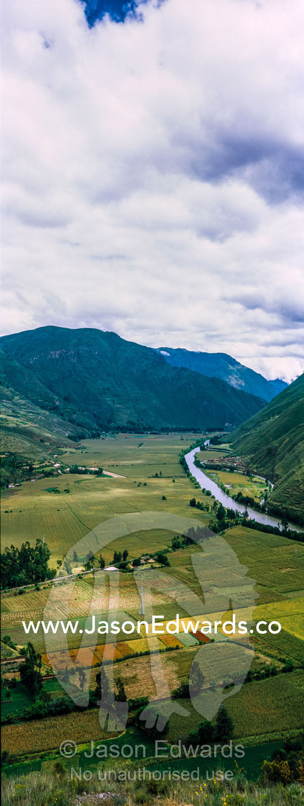 Agricultural farmland in a lush river valley in the Andes. Pisac, Peru.