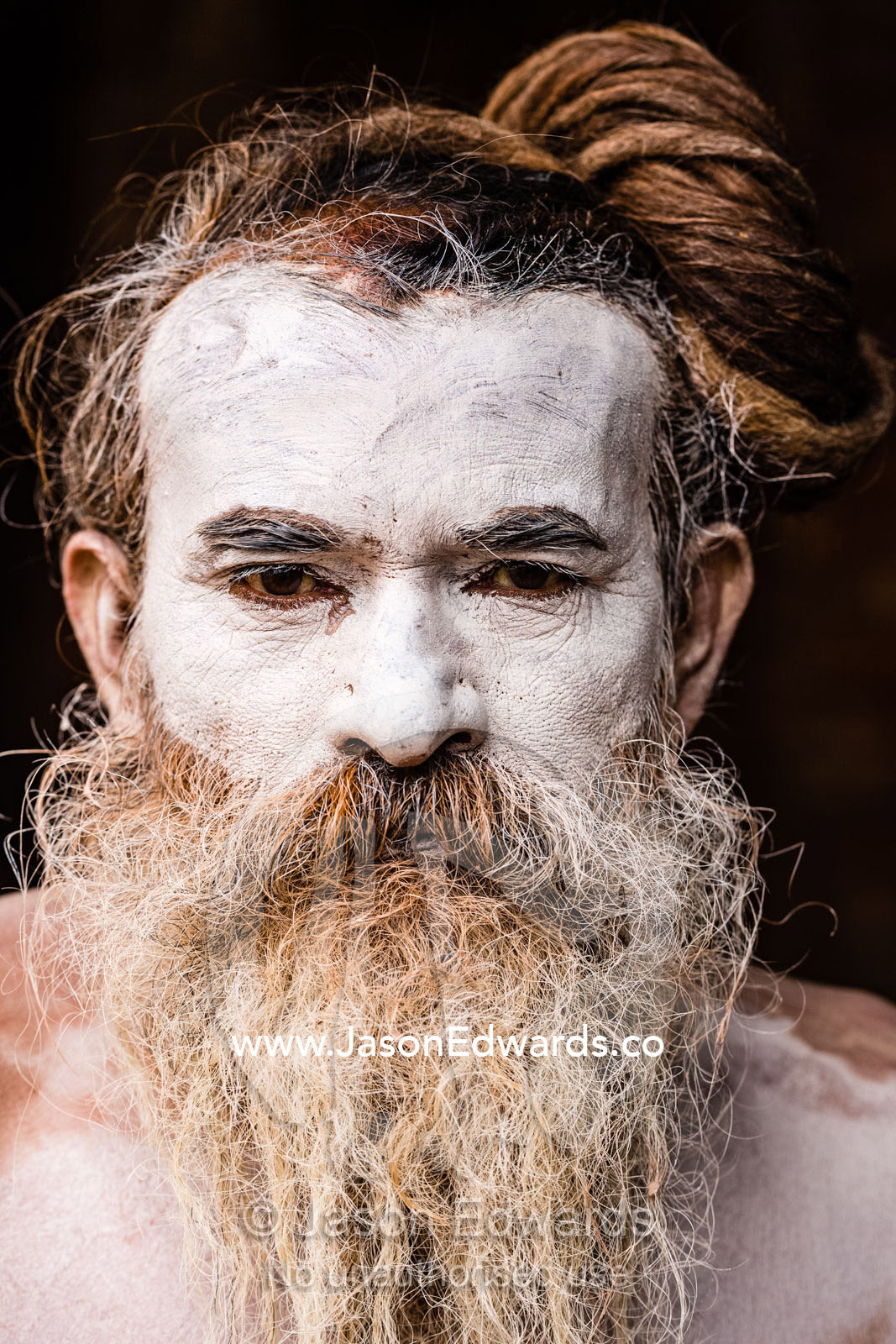 A sadhu, an ascetic Hindu holy man, with body paint consisting of cremation ash. Kathmandu, Pashupatinath Temple, Nepal
